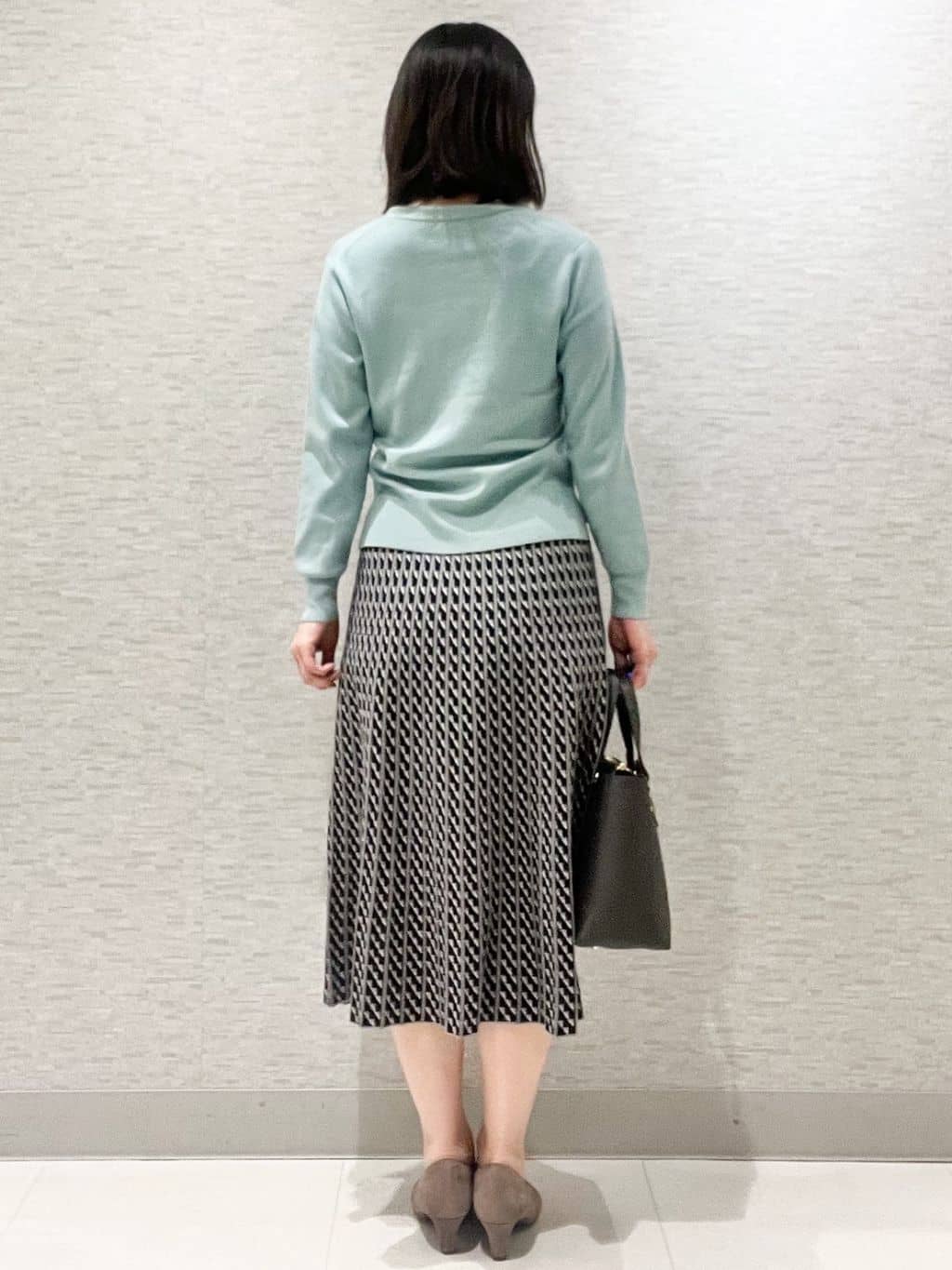 marikoさんの「Reflect｜【WEB先行カラーあり／セットアップ可】幾何調柄ニットスカート」を使ったコーディネート