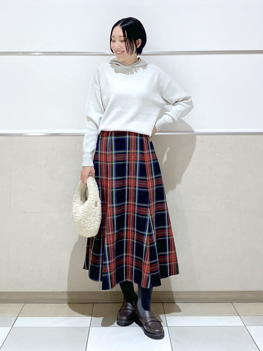 eriko さんの「Dessin｜【洗える】チェック柄起毛フレアスカート」を使ったコーディネート