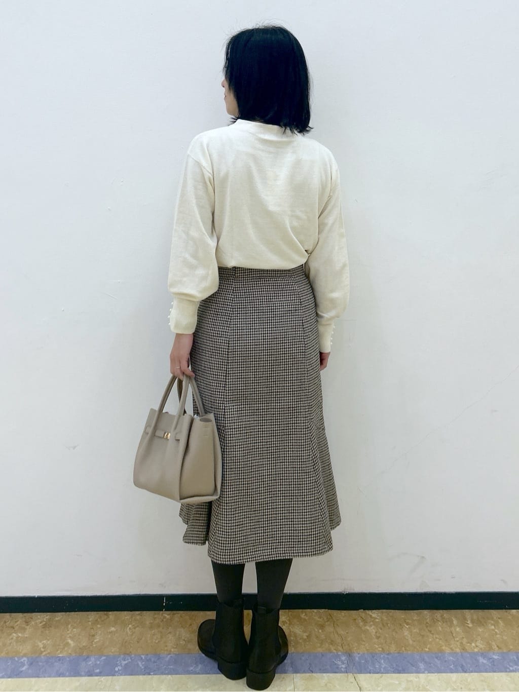 su.さんの「index｜ふんわりボトルネックパフスリーブニット【洗濯機OK】」を使ったコーディネート