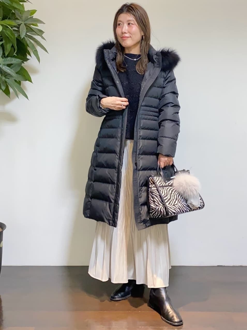 tomoさんの「UNTITLED｜【はっ水機能/フード取り外し可/防寒】ロングダウンコート」を使ったコーディネート