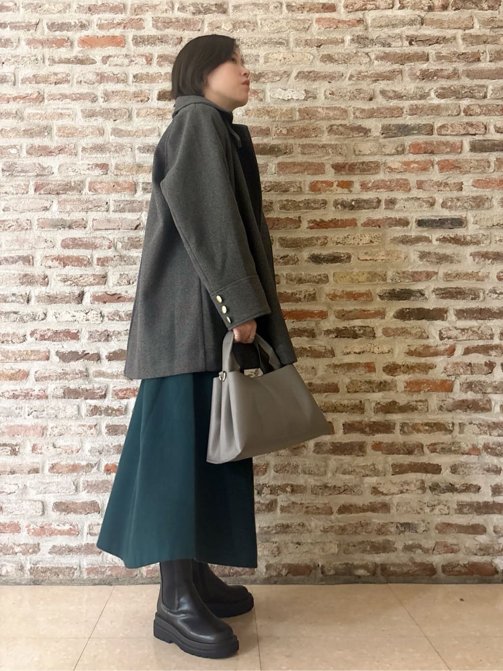 しばさんの「THE SHOP TK｜クラシカルな装い ウールライクスタンドカラーコート」を使ったコーディネート