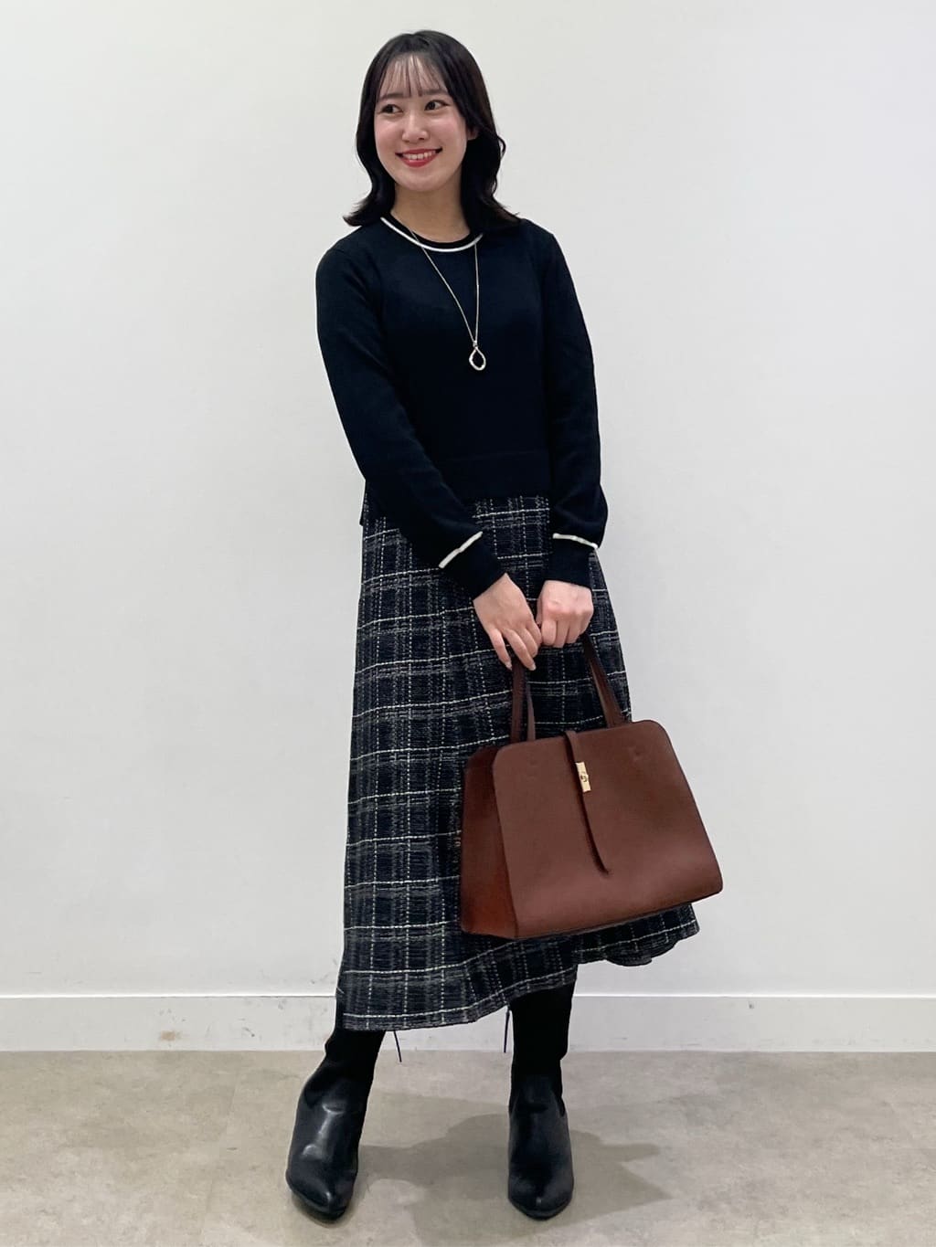 yukariさんの「Reflect｜【コートインでもすっきり◎】チェック柄ニットドッキングワンピース」を使ったコーディネート