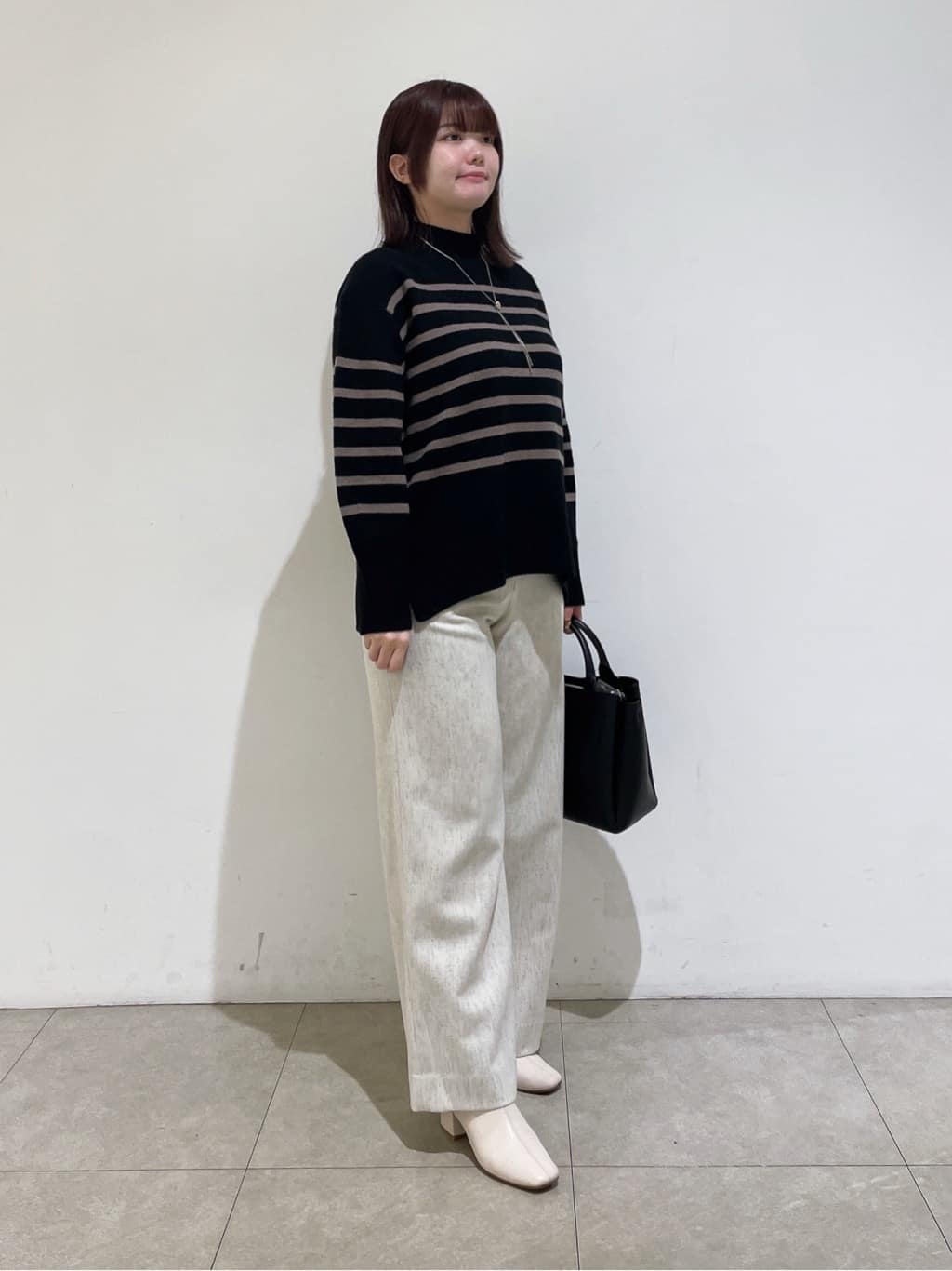 emikaさんの「INDIVI｜【冬ニット人気NO．1！／カシミヤ混】ミドルゲージハイネックニット」を使ったコーディネート