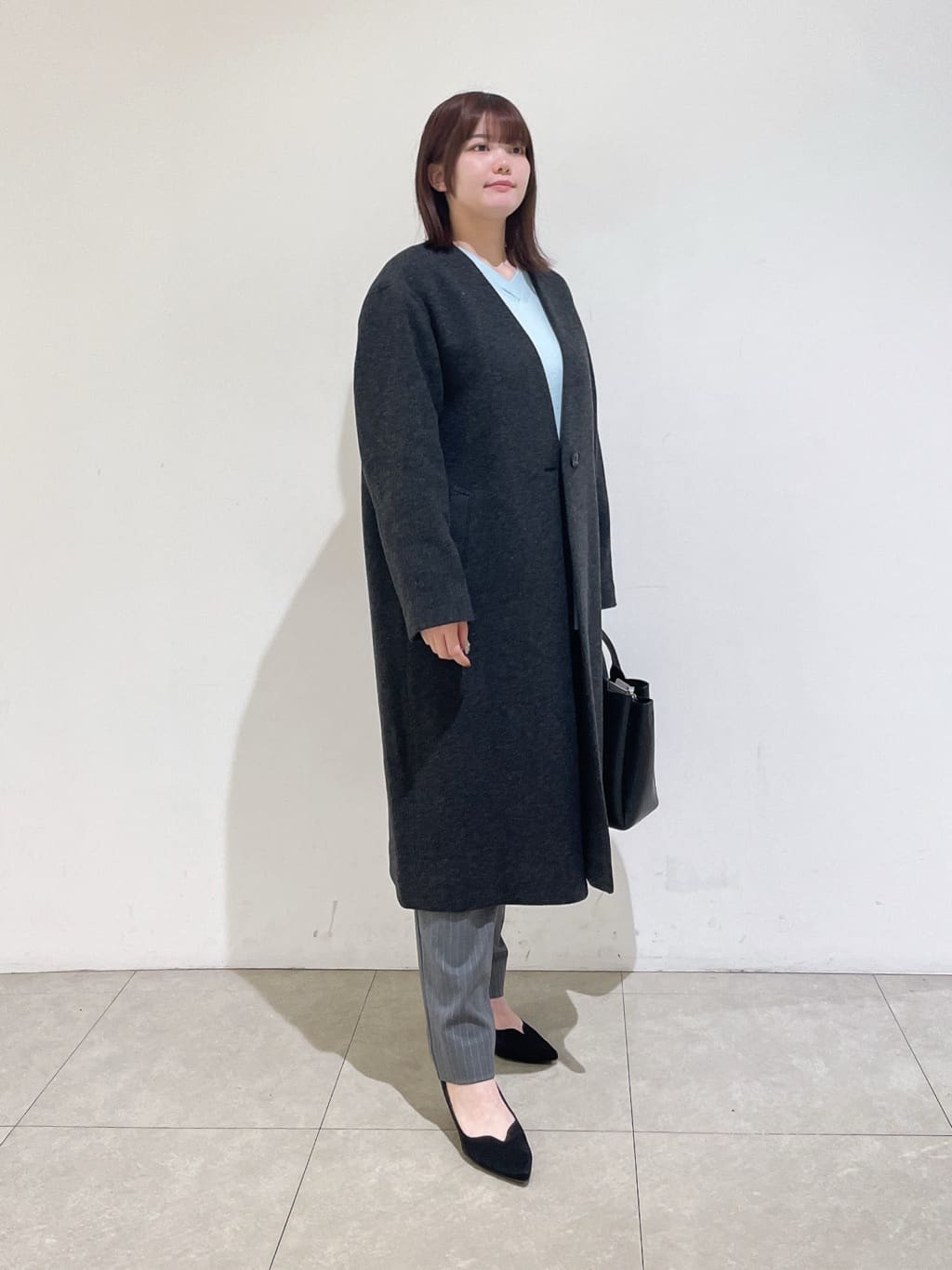 emikaさんの「INDIVI｜【軽量／ウール混】ライトフォルム ロングコート」を使ったコーディネート