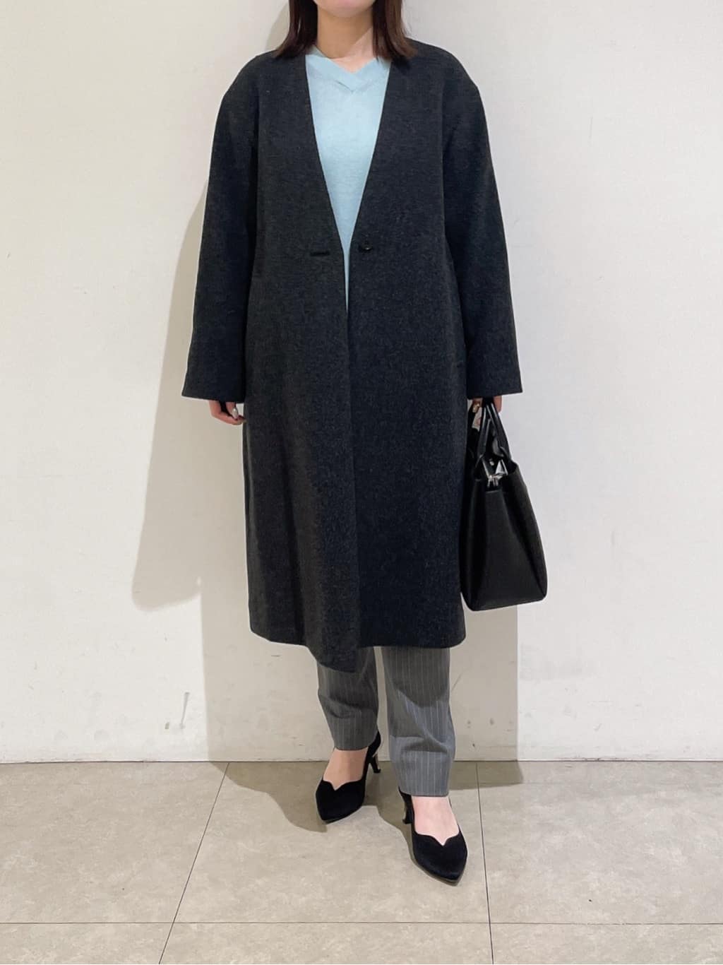 emikaさんの「INDIVI｜【軽量／ウール混】ライトフォルム ロングコート」を使ったコーディネート