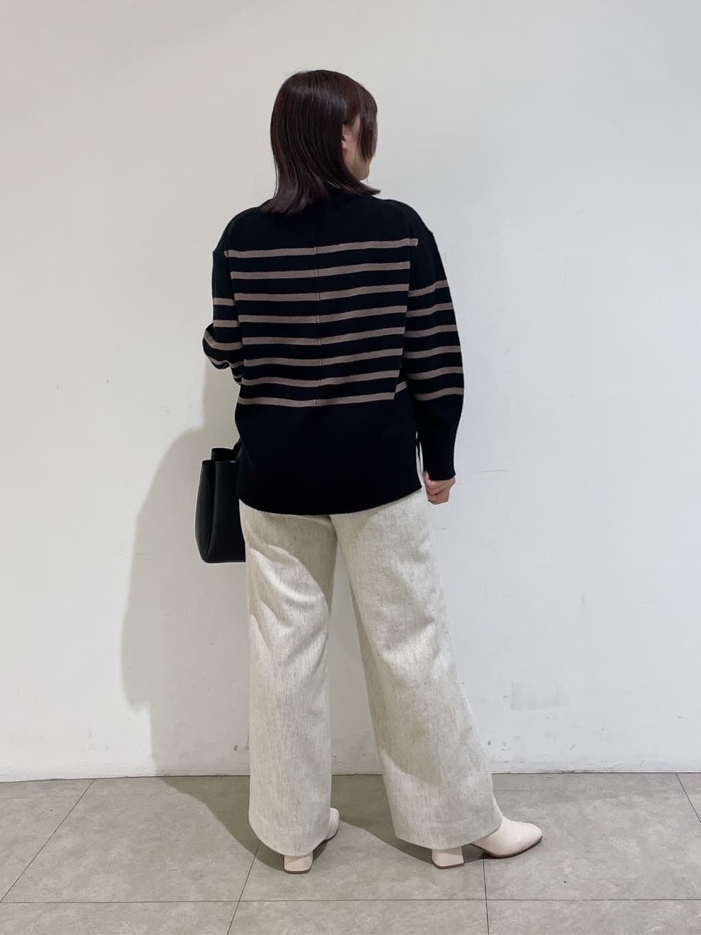 emikaさんの「INDIVI｜【冬ニット人気NO．1！／カシミヤ混】ミドルゲージハイネックニット」を使ったコーディネート