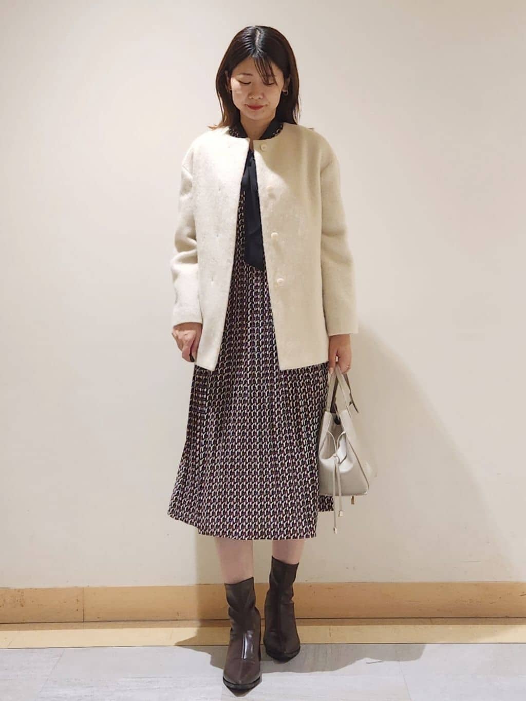 yukaさんの「COUP DE CHANCE｜【リボン取り外し可】幾何柄プリーツワンピース」を使ったコーディネート