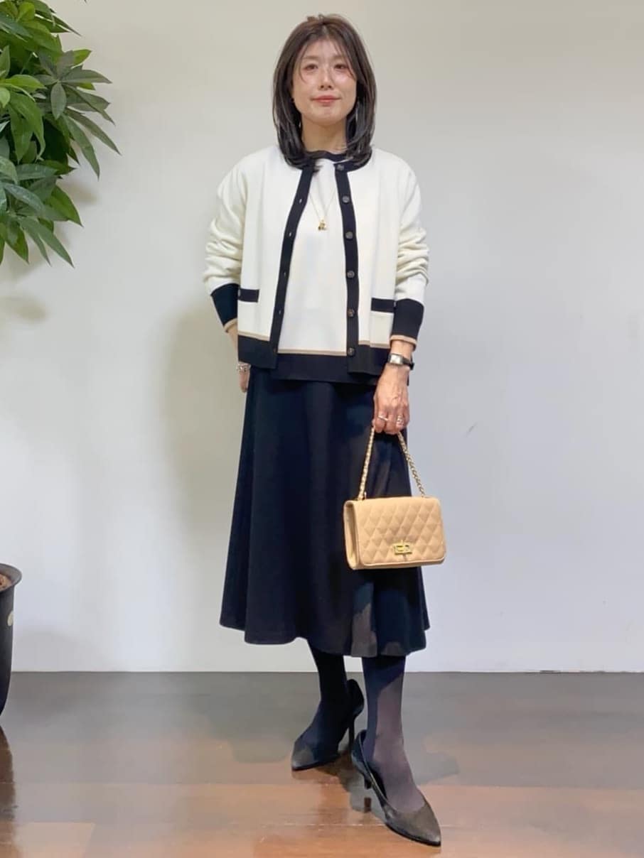 tomoさんの「UNTITLED｜【トレンド／ギフト】ファー＆ポーチチャーム」を使ったコーディネート