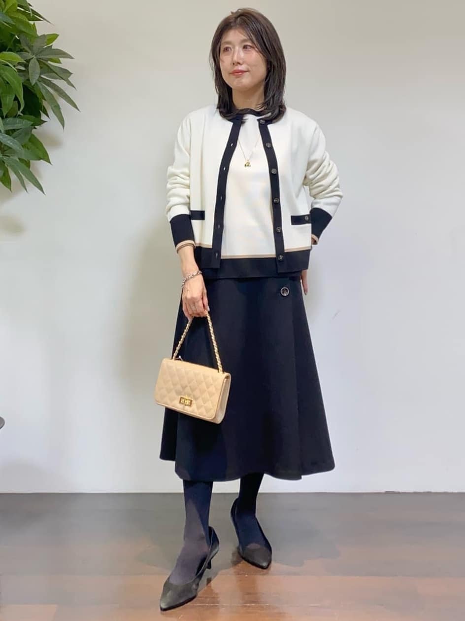 tomoさんの「UNTITLED｜【トレンド／ギフト】ファー＆ポーチチャーム」を使ったコーディネート