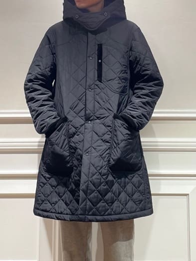 橋本さんの「DRESSTERIOR｜キルティング フーデット コート」を使ったコーディネート