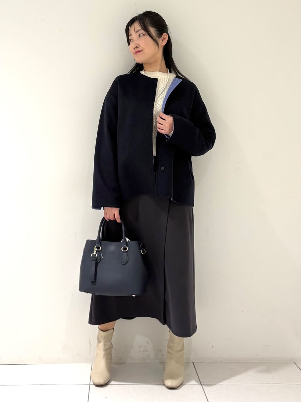 momokoさんの「INDIVI｜【配色デザイン／ショート丈】ウールリバー ノーカラーコート」を使ったコーディネート