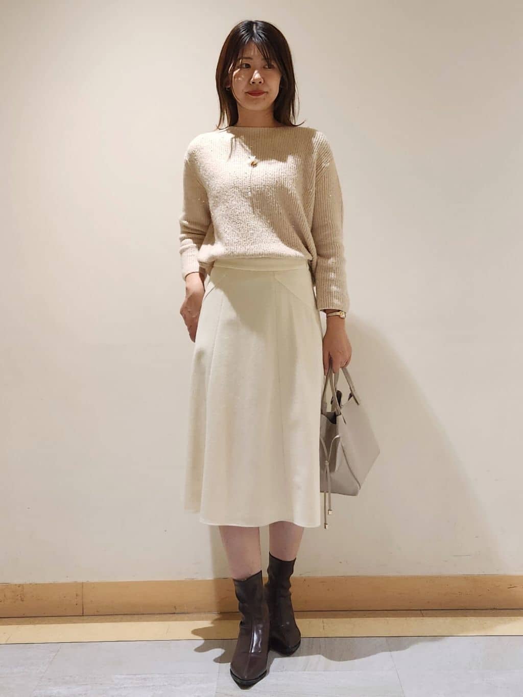 yukaさんの「COUP DE CHANCE｜【手洗い可】スパンコール付ニットトップス」を使ったコーディネート