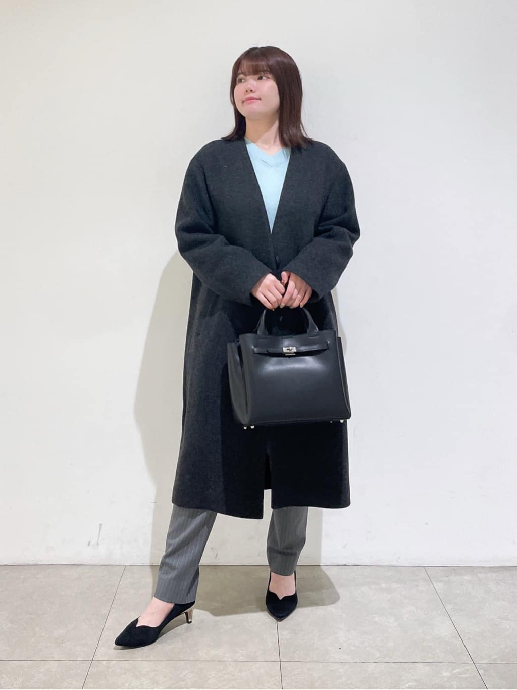 emikaさんの「INDIVI｜【軽量／ウール混】ライトフォルム ロングコート」を使ったコーディネート