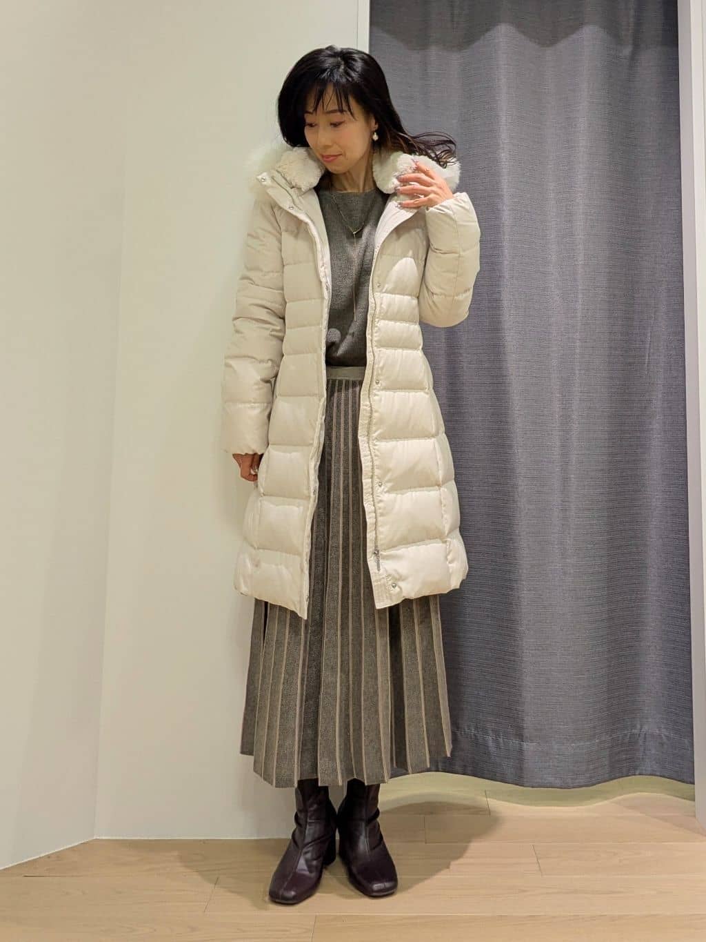 miiさんの「INDIVI｜【名品／撥水／抗菌防臭】ロング丈リサイクルダウンコート」を使ったコーディネート