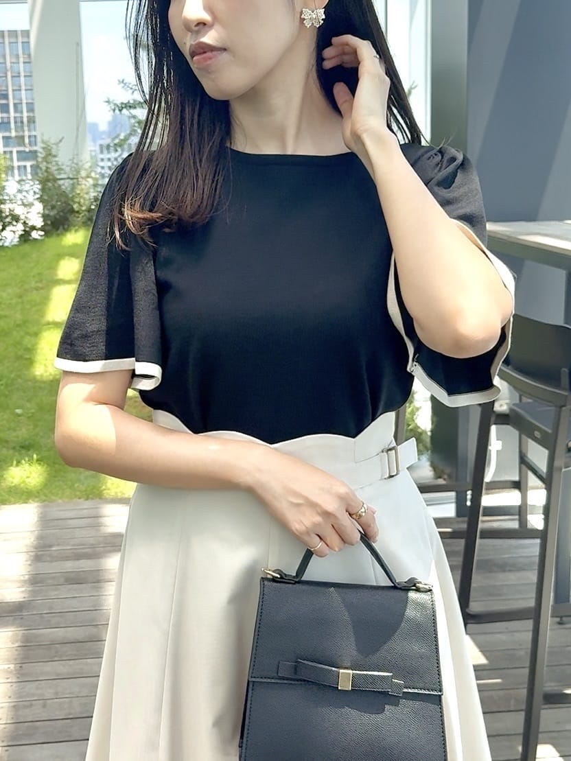 teiさんの「Couture brooch｜【フェミニン・5分袖・通勤】配色フレアスリーブニット」を使ったコーディネート
