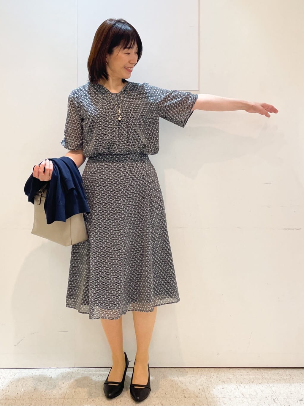 めいさんの「Reflect｜【マシンウォッシュ可／セットアップ可】コツキ柄プリントフレアスカート」を使ったコーディネート