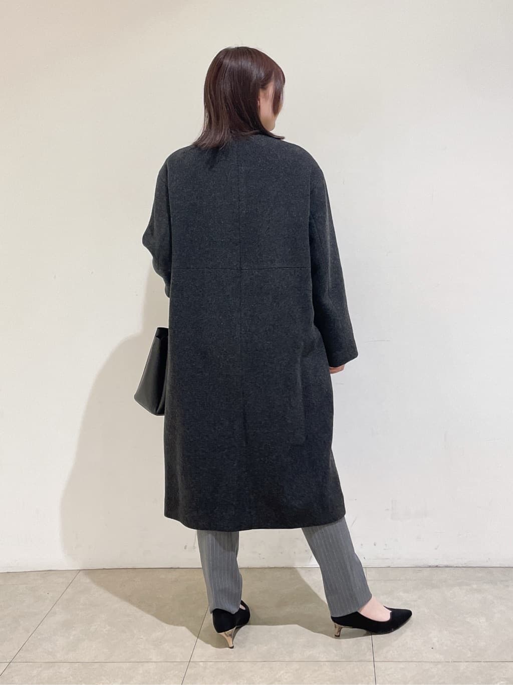 emikaさんの「INDIVI｜【軽量／ウール混】ライトフォルム ロングコート」を使ったコーディネート