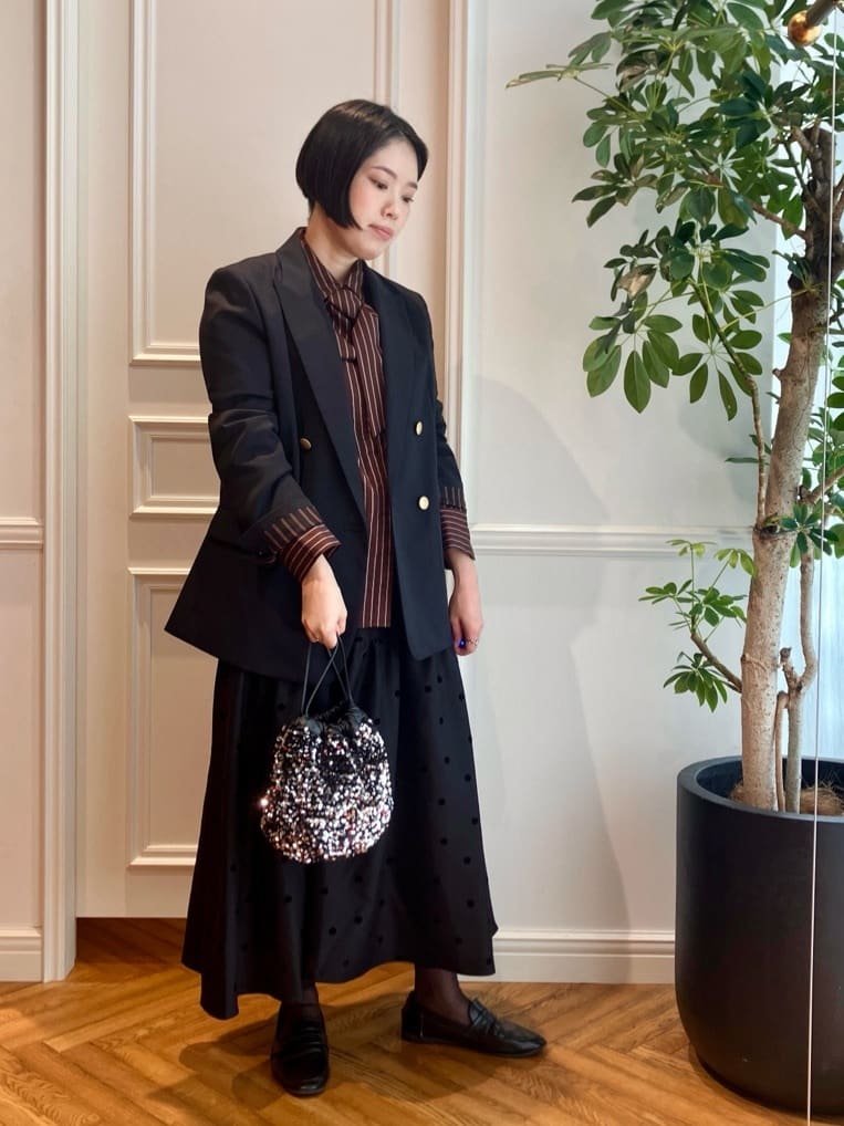 konominさんの「DRESSTERIOR｜スパンコール2WAY巾着バッグ」を使ったコーディネート