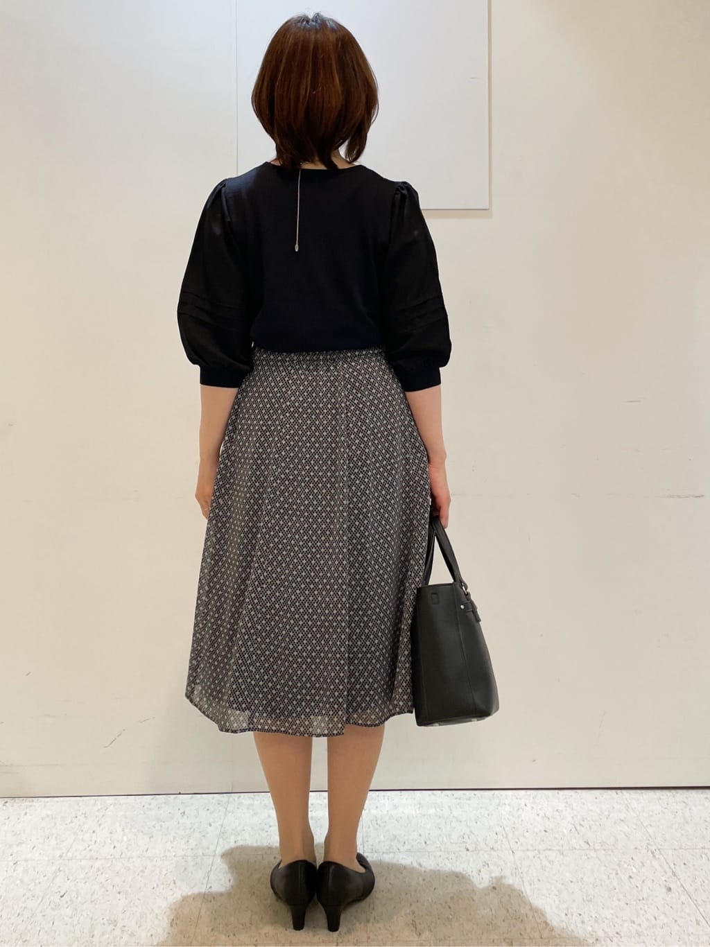 めいさんの「Reflect｜【マシンウォッシュ可／セットアップ可】コツキ柄プリントフレアスカート」を使ったコーディネート