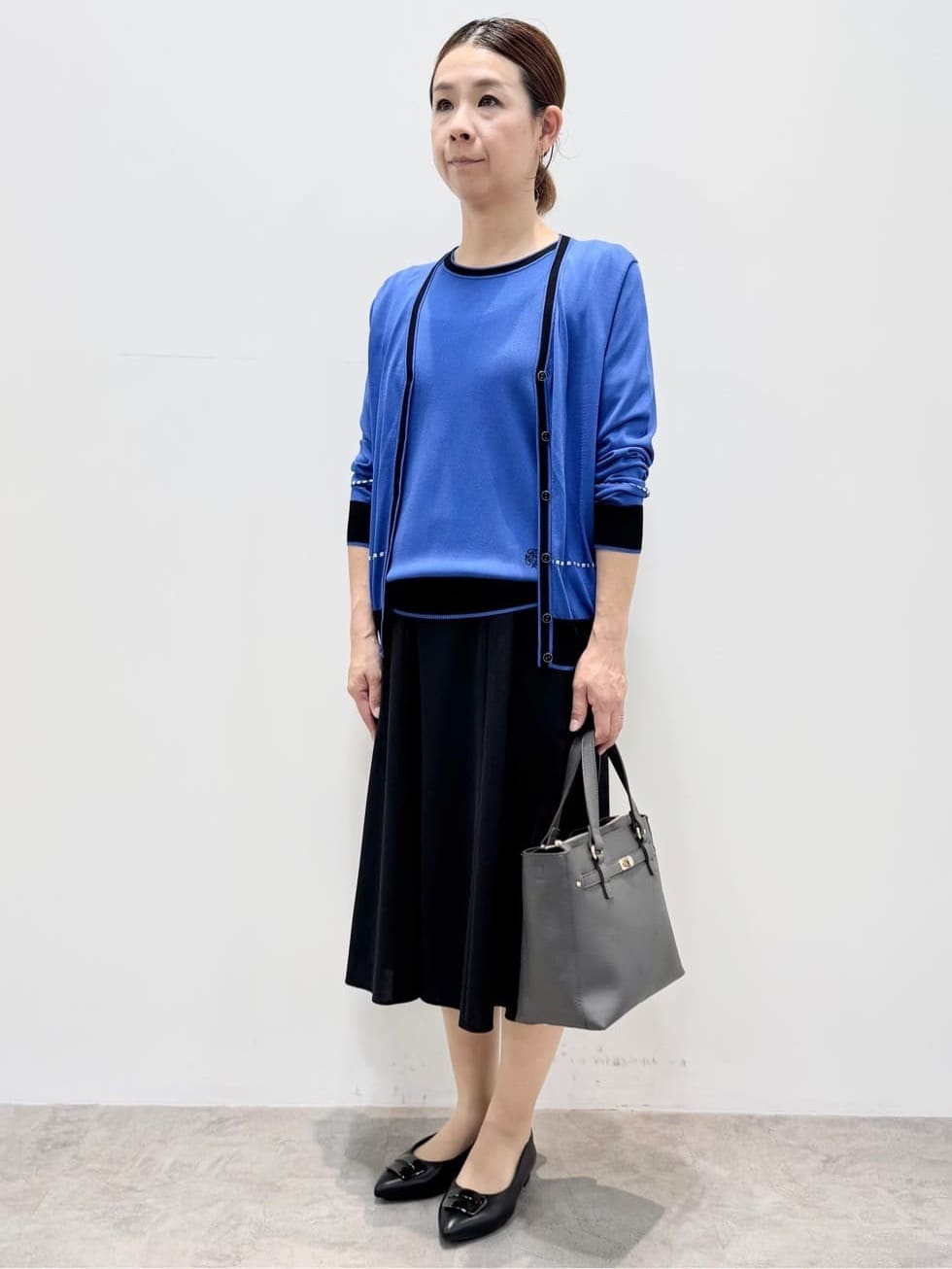 koyaさんの「Reflect｜【WEB先行カラーあり／手洗い可／アンサンブル可】バイカラーカーディガン」を使ったコーディネート