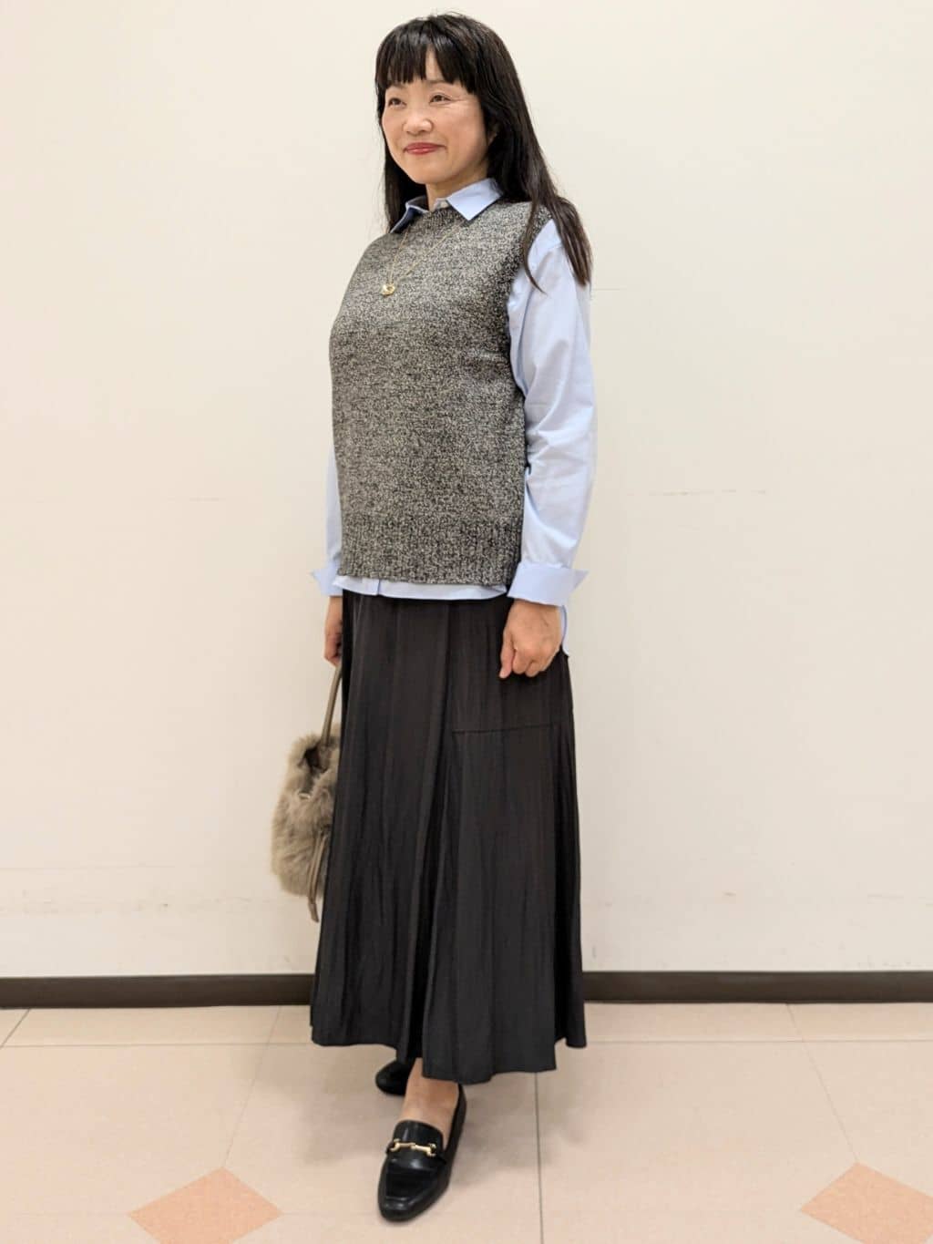 ともさんの「UNTITLED｜【重ね着レイヤードに】杢調ニットベスト」を使ったコーディネート