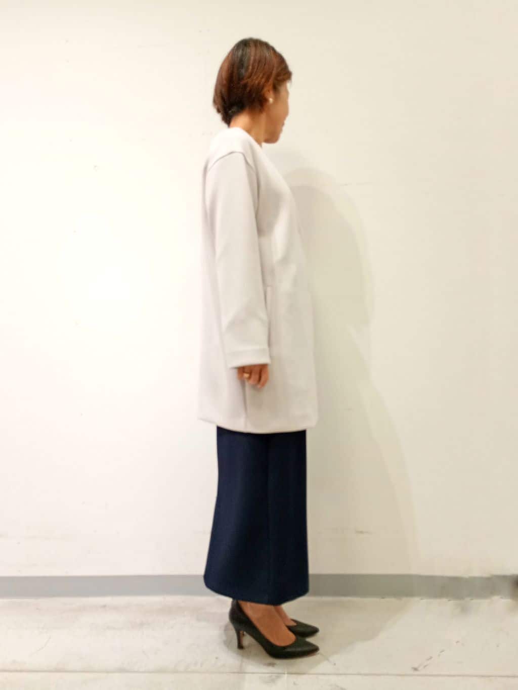 Kさんの「INDIVI｜【秋／軽羽織り】ノーカラーミドル丈ライトコート」を使ったコーディネート