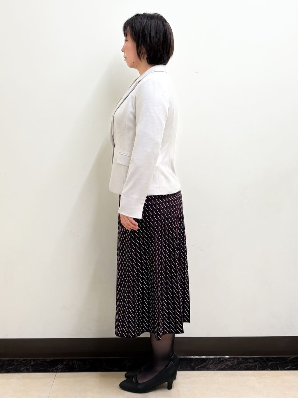 ミヨさんの「Reflect｜【WEB先行カラーあり／セットアップ可】幾何調柄ニットスカート」を使ったコーディネート