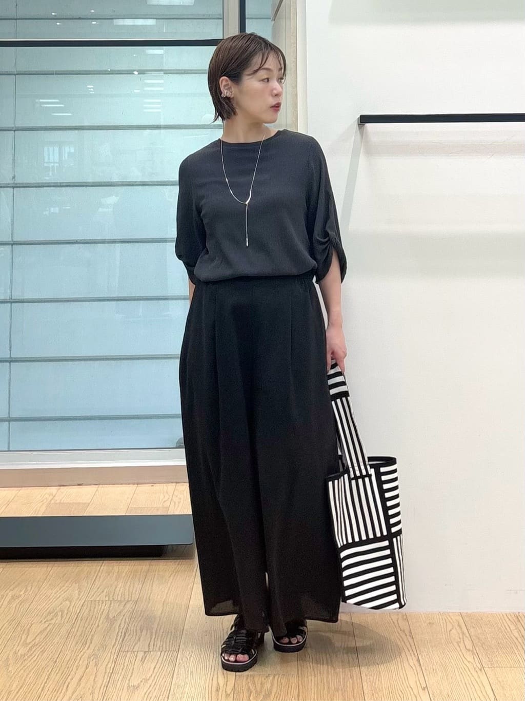asamiさんの「INDIVI｜【UVケア／吸汗速乾】凹凸素材ねじり袖トップス」を使ったコーディネート