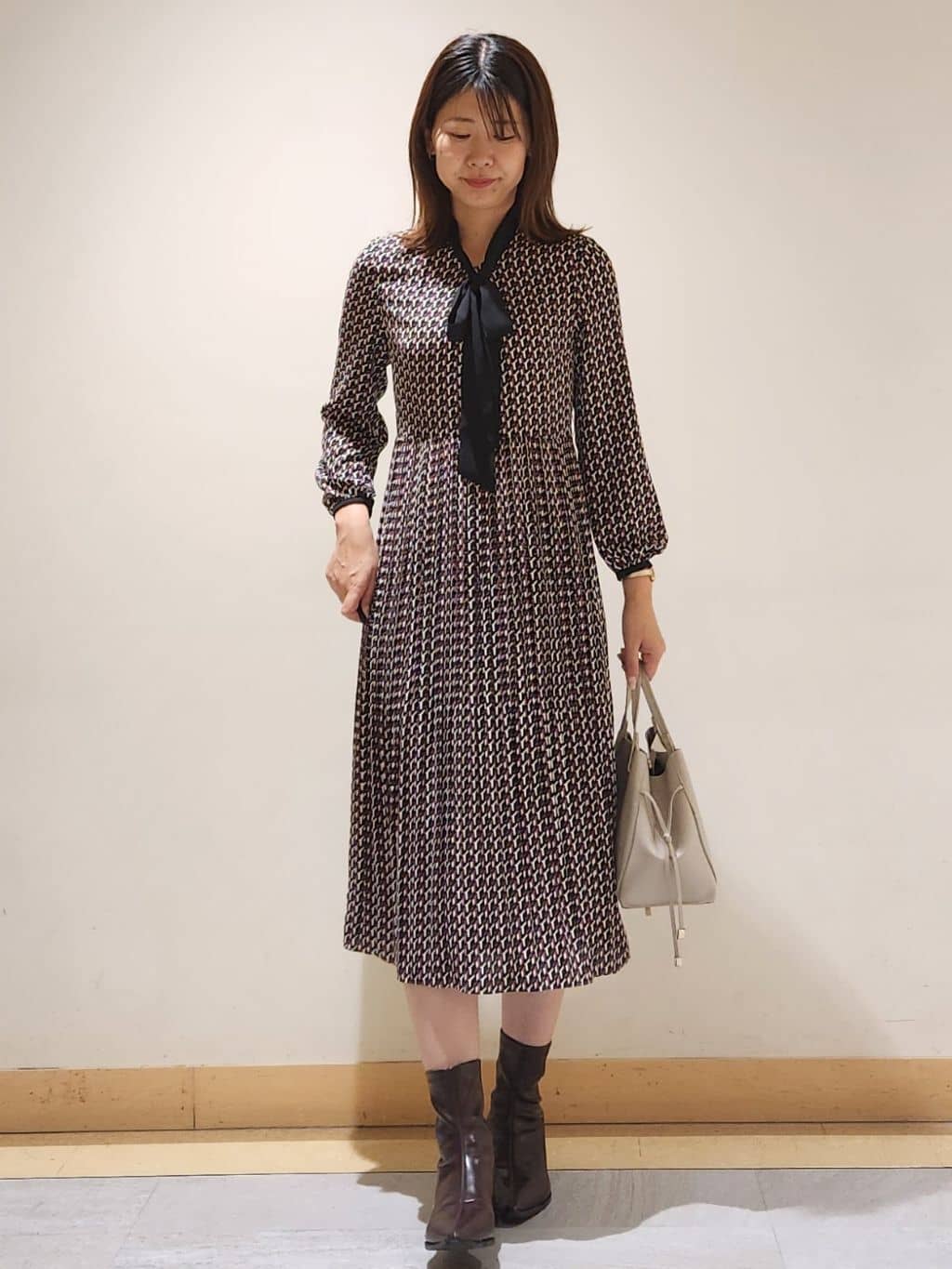 yukaさんの「COUP DE CHANCE｜【リボン取り外し可】幾何柄プリーツワンピース」を使ったコーディネート