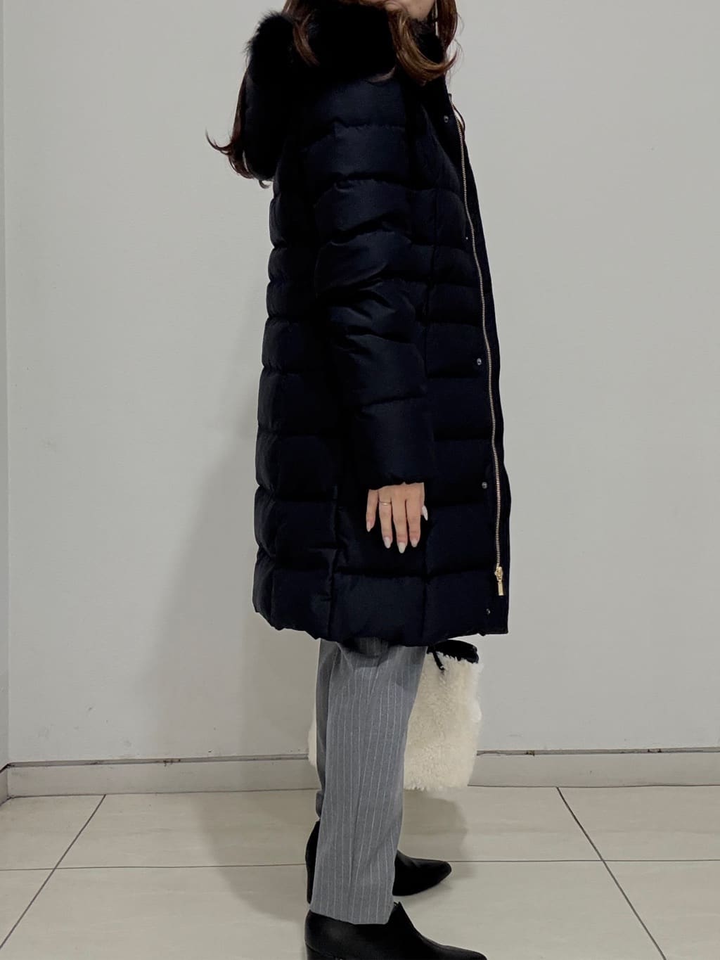 kahoさんの「INDIVI｜【名品／撥水／抗菌防臭】ロング丈リサイクルダウンコート」を使ったコーディネート