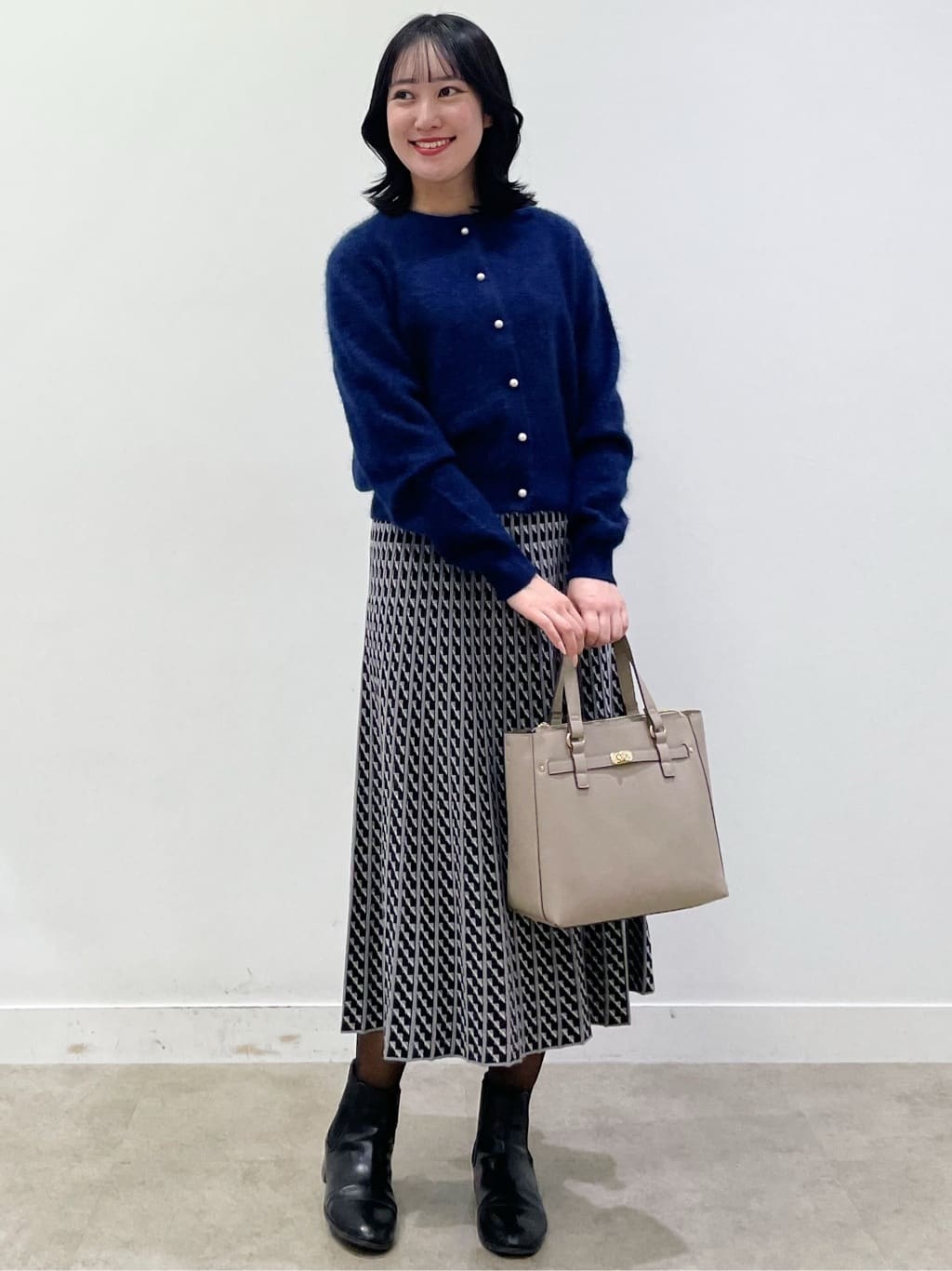 yukariさんの「Reflect｜【WEB先行カラーあり／セットアップ可】幾何調柄ニットスカート」を使ったコーディネート