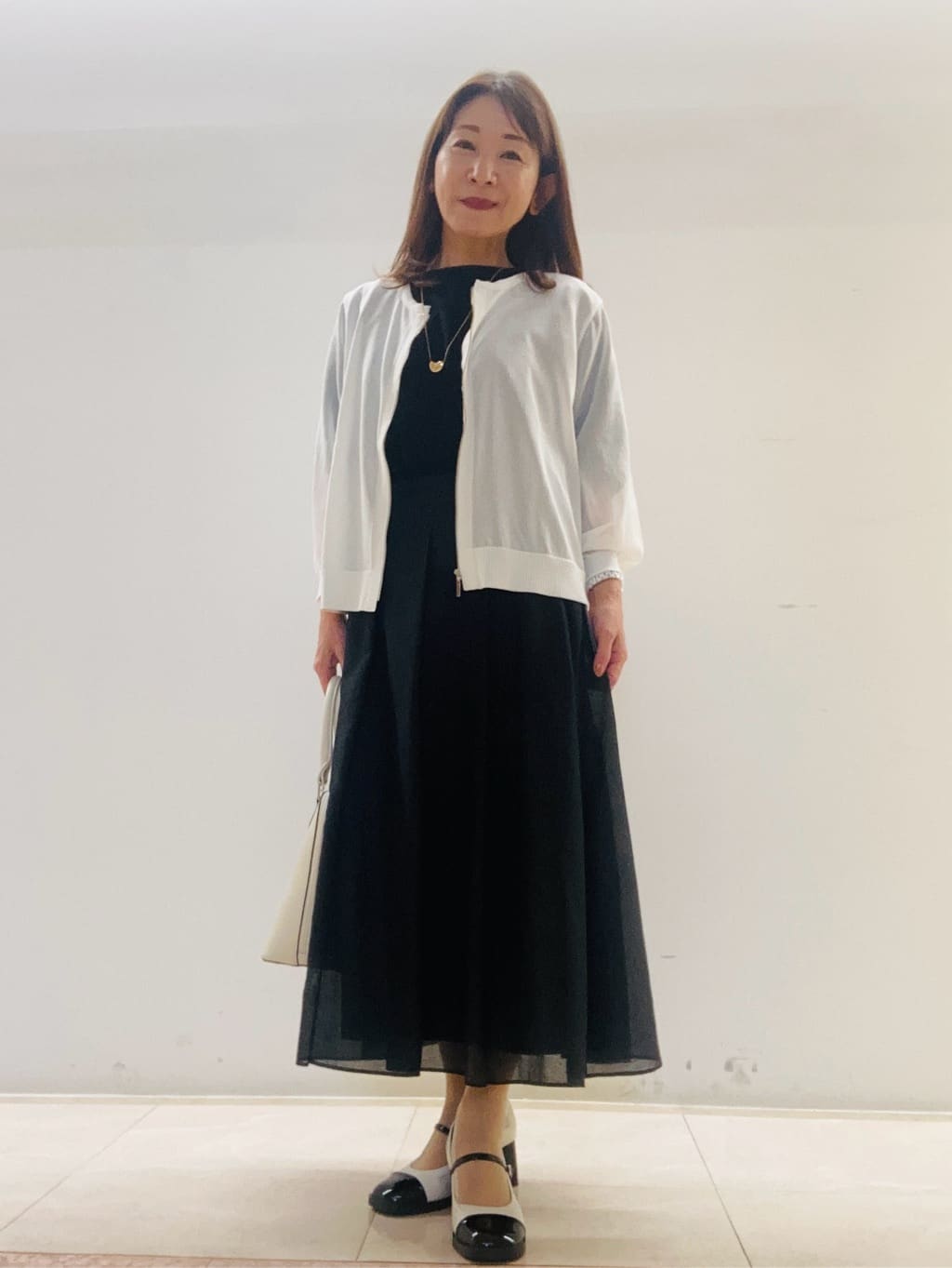 kurodaさんの「Reflect｜【マシンウォッシュ可／セットアップ可】シアーボックスタックプリーツスカート」を使ったコーディネート