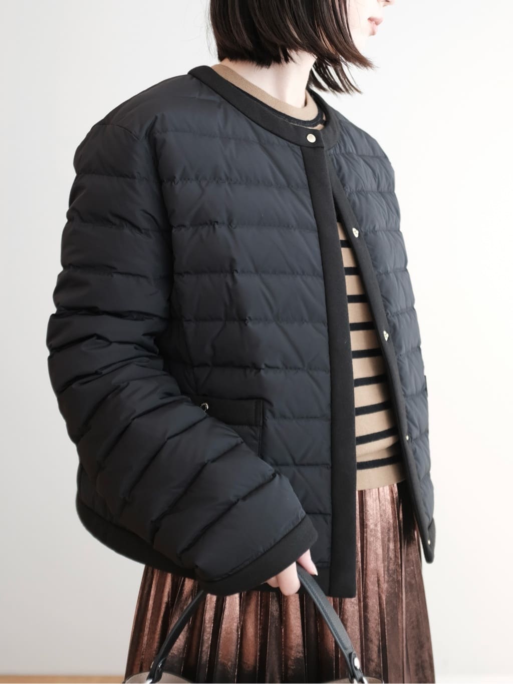 Kishimotoさんの「DRESSTERIOR｜◆【洗える/ストレッチ性/オンオフ】箔プリントプリーツスカート」を使ったコーディネート