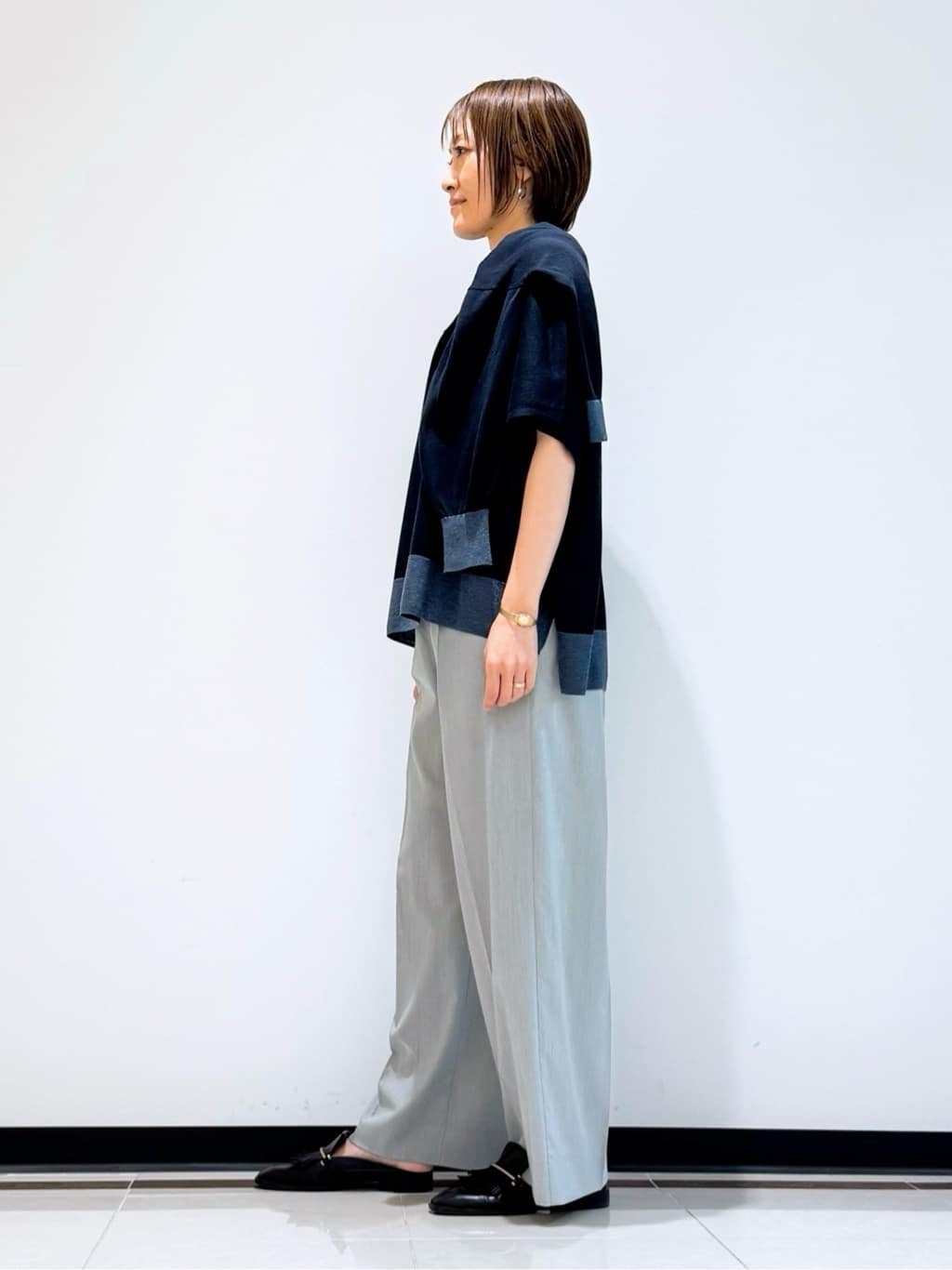 mikaさんの「INDIVI｜【洗える／二の腕カバー】バイカラーラメニット」を使ったコーディネート