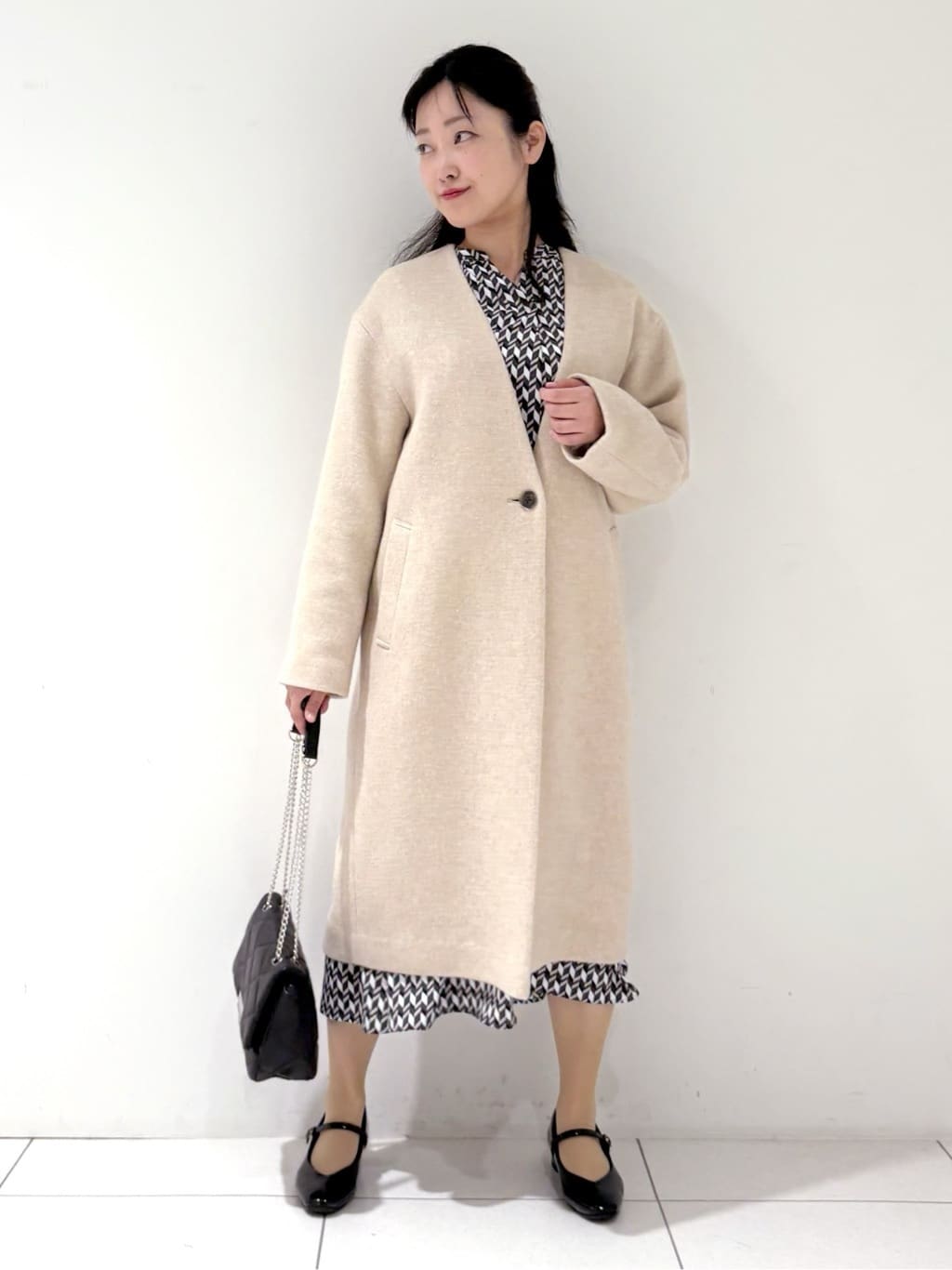 momokoさんの「INDIVI｜【軽量／ウール混】ライトフォルム ロングコート」を使ったコーディネート
