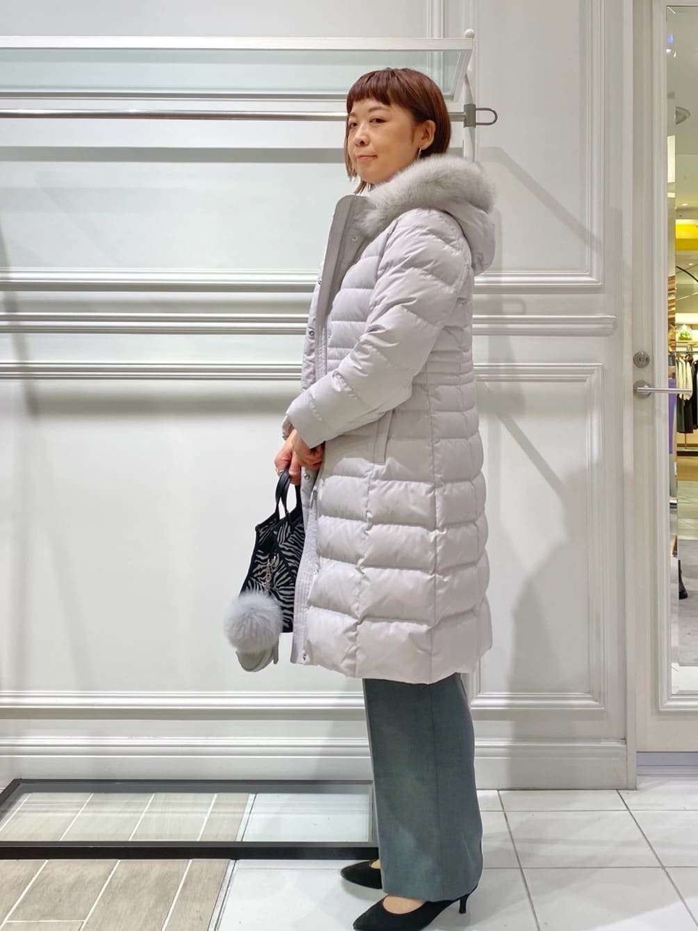 AKKOさんの「UNTITLED｜【はっ水機能/フード取り外し可/防寒】ロングダウンコート」を使ったコーディネート
