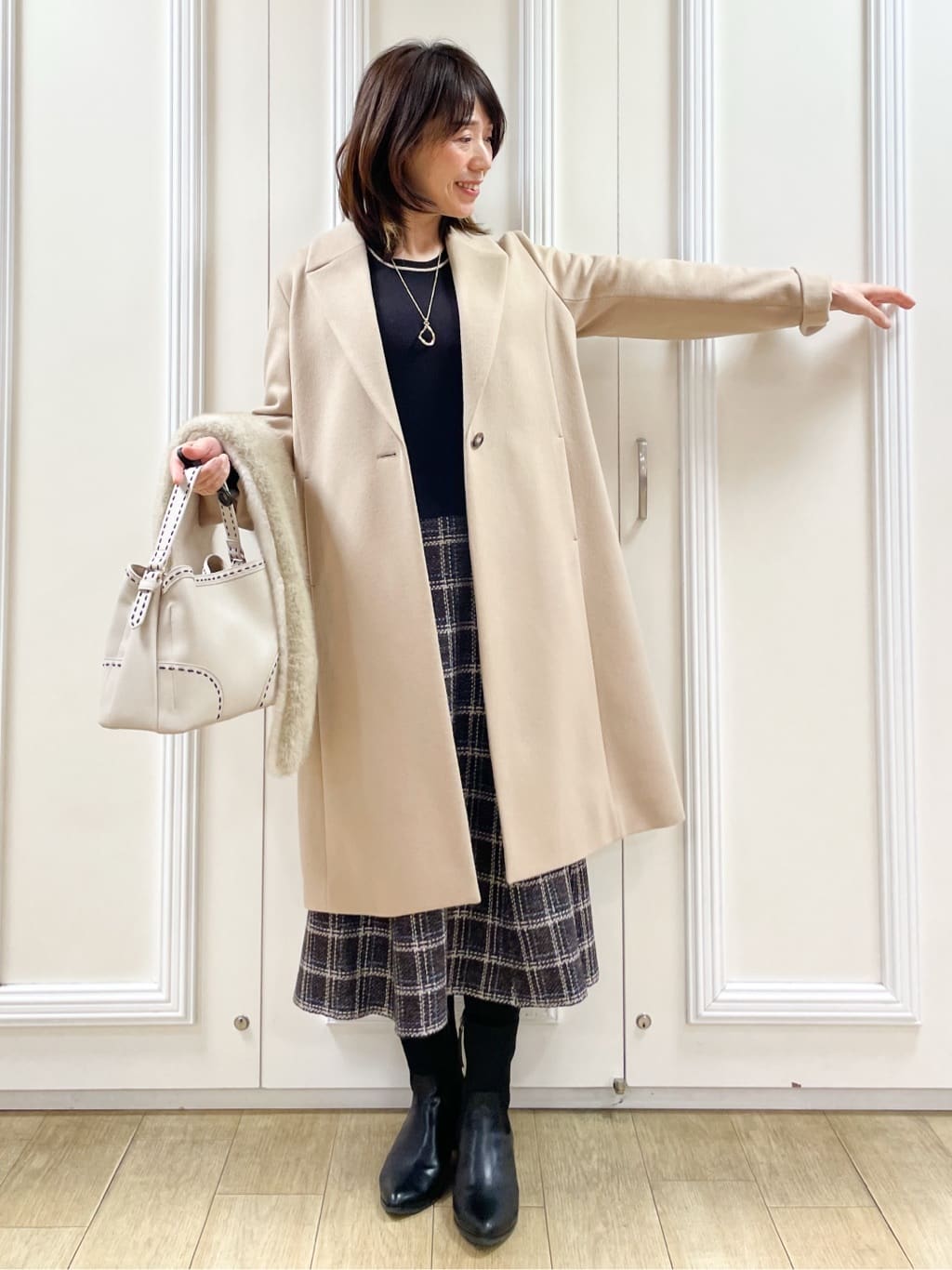 めいさんの「Reflect｜【コートインでもすっきり◎】チェック柄ニットドッキングワンピース」を使ったコーディネート