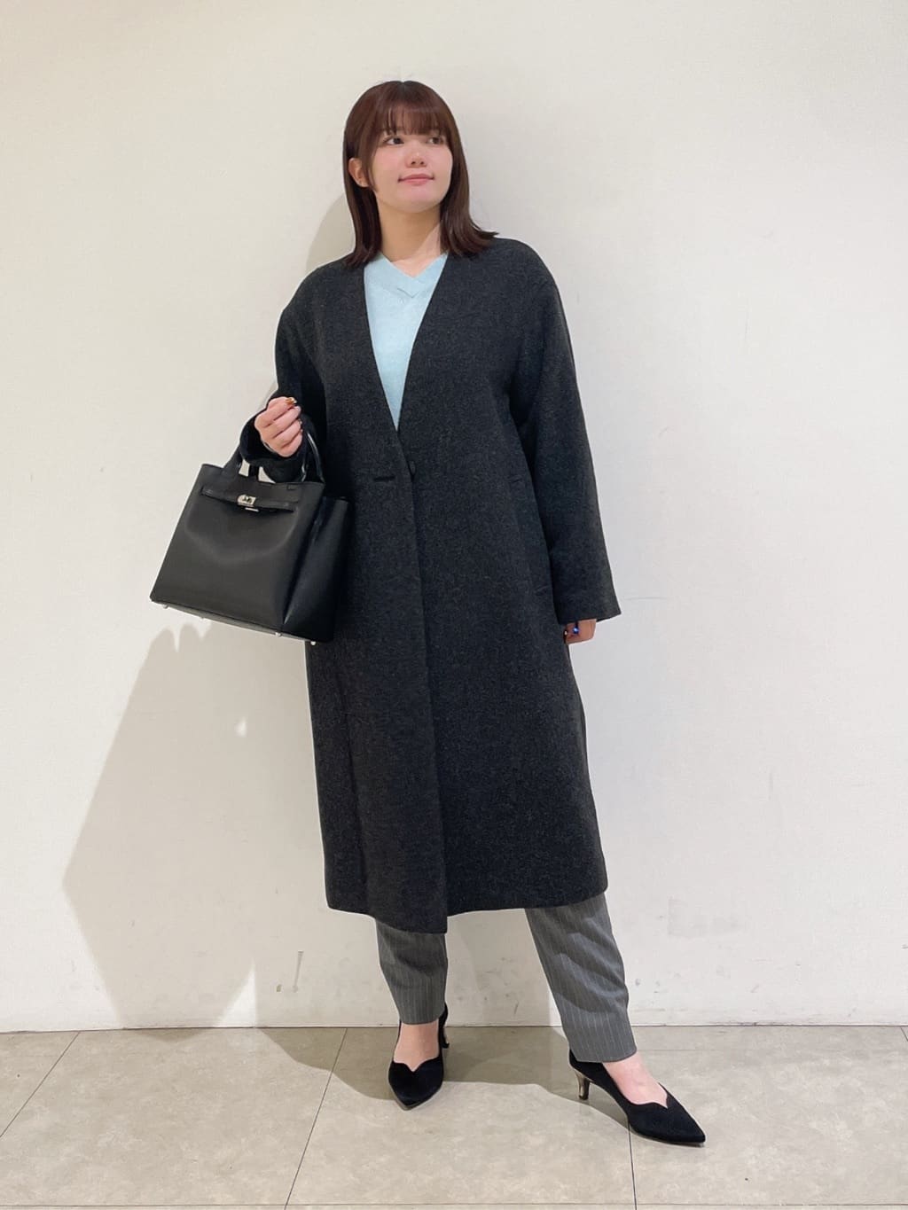 emikaさんの「INDIVI｜【軽量／ウール混】ライトフォルム ロングコート」を使ったコーディネート