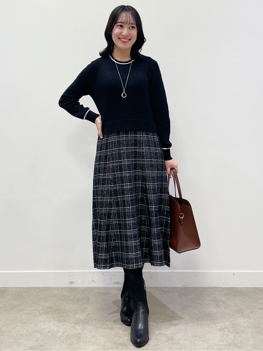 yukariさんの「Reflect｜【コートインでもすっきり◎】チェック柄ニットドッキングワンピース」を使ったコーディネート
