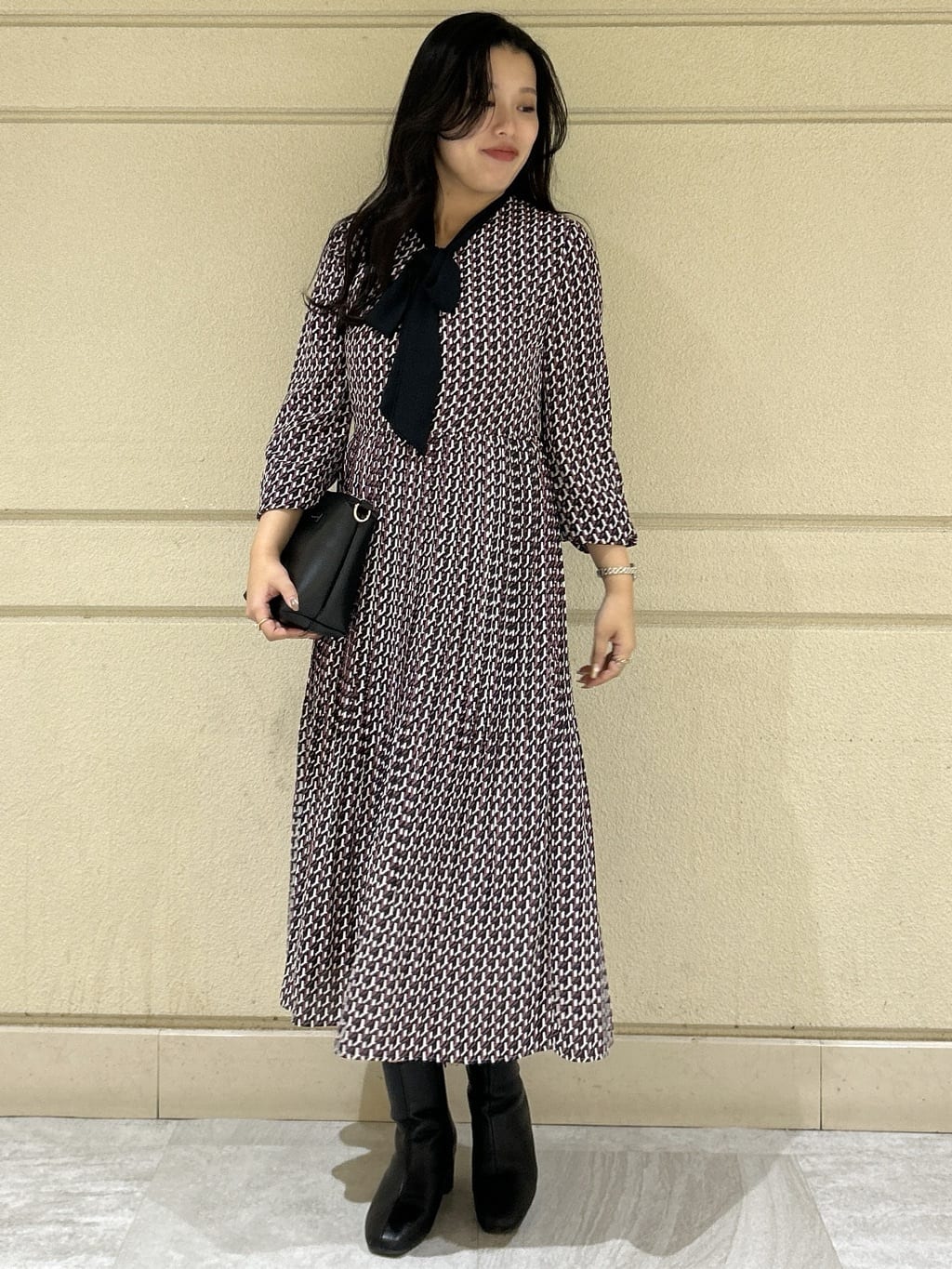 Momokaさんの「COUP DE CHANCE｜【リボン取り外し可】幾何柄プリーツワンピース」を使ったコーディネート