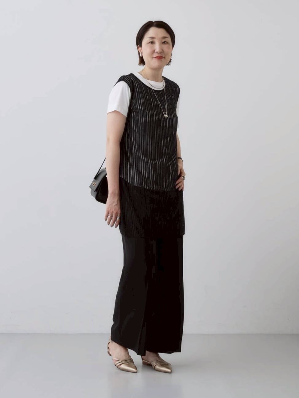 yuriさんの「INDIVI｜ミニスクエアショルダー」を使ったコーディネート