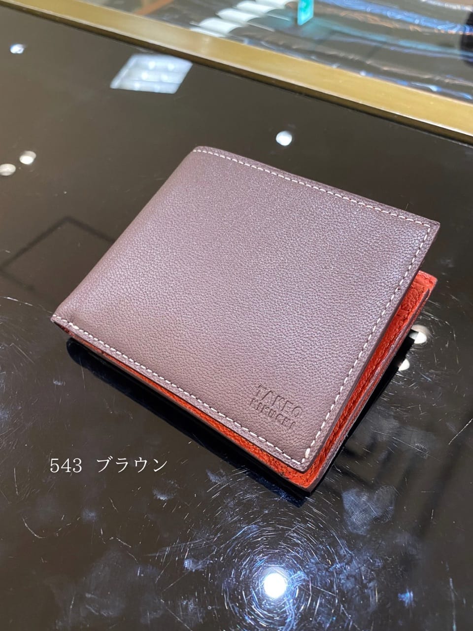 小南大和さんの「TAKEO KIKUCHI｜ゴートスキン 2つ折り財布」を使ったコーディネート