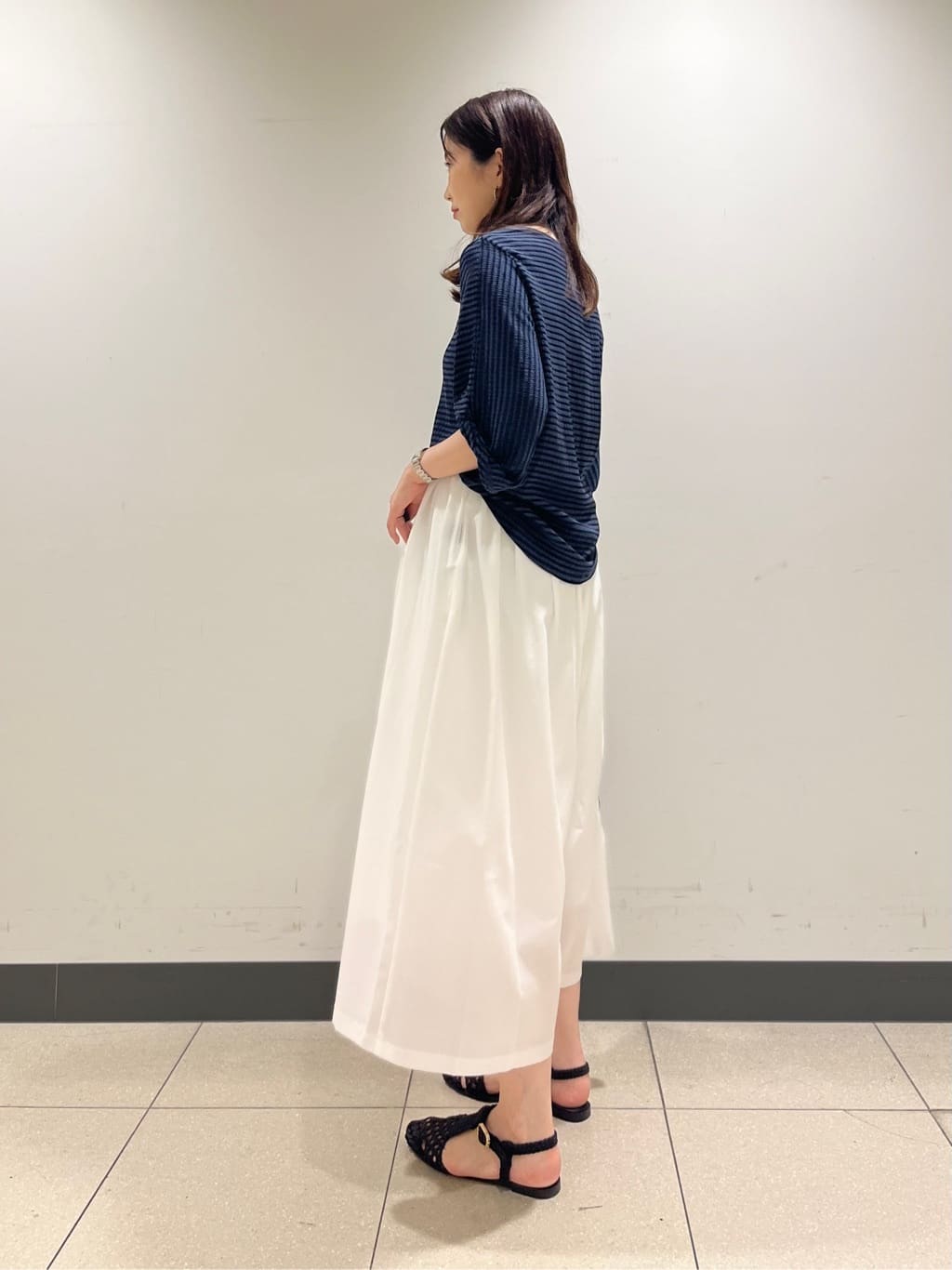 shokoさんの「INDIVI｜【UVケア／吸汗速乾】凹凸素材ねじり袖トップス」を使ったコーディネート