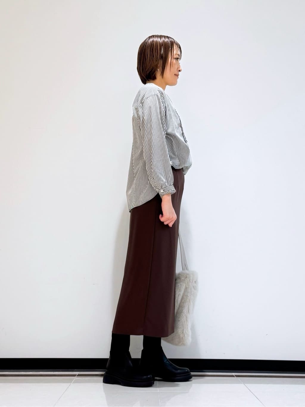 mikaさんの「INDIVI｜【洗える】胸元タックフリル長袖ブラウス」を使ったコーディネート