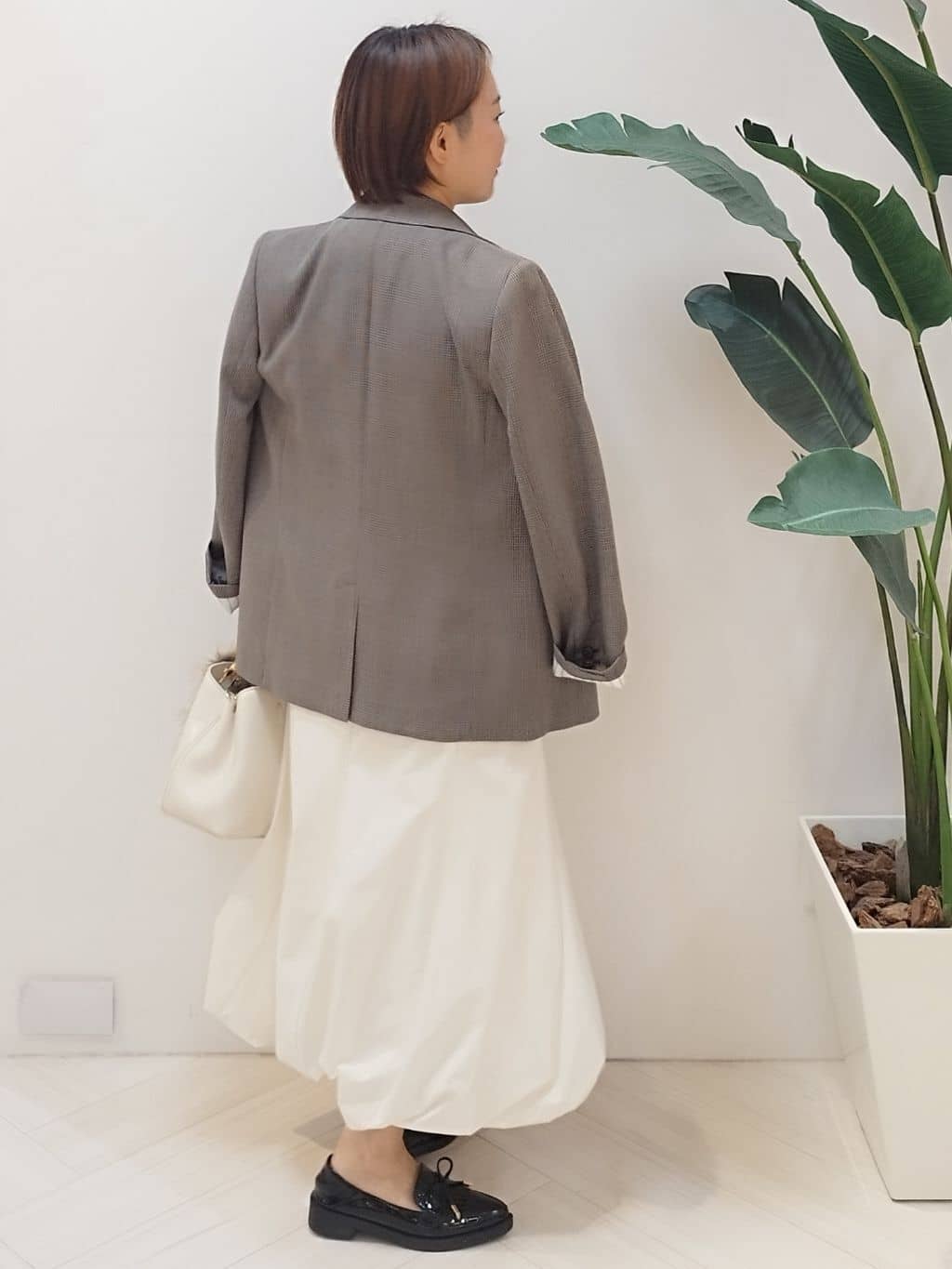 s u g iさんの「UNTITLED｜【ストレッチ素材/撥水加工】バルーンスカート」を使ったコーディネート