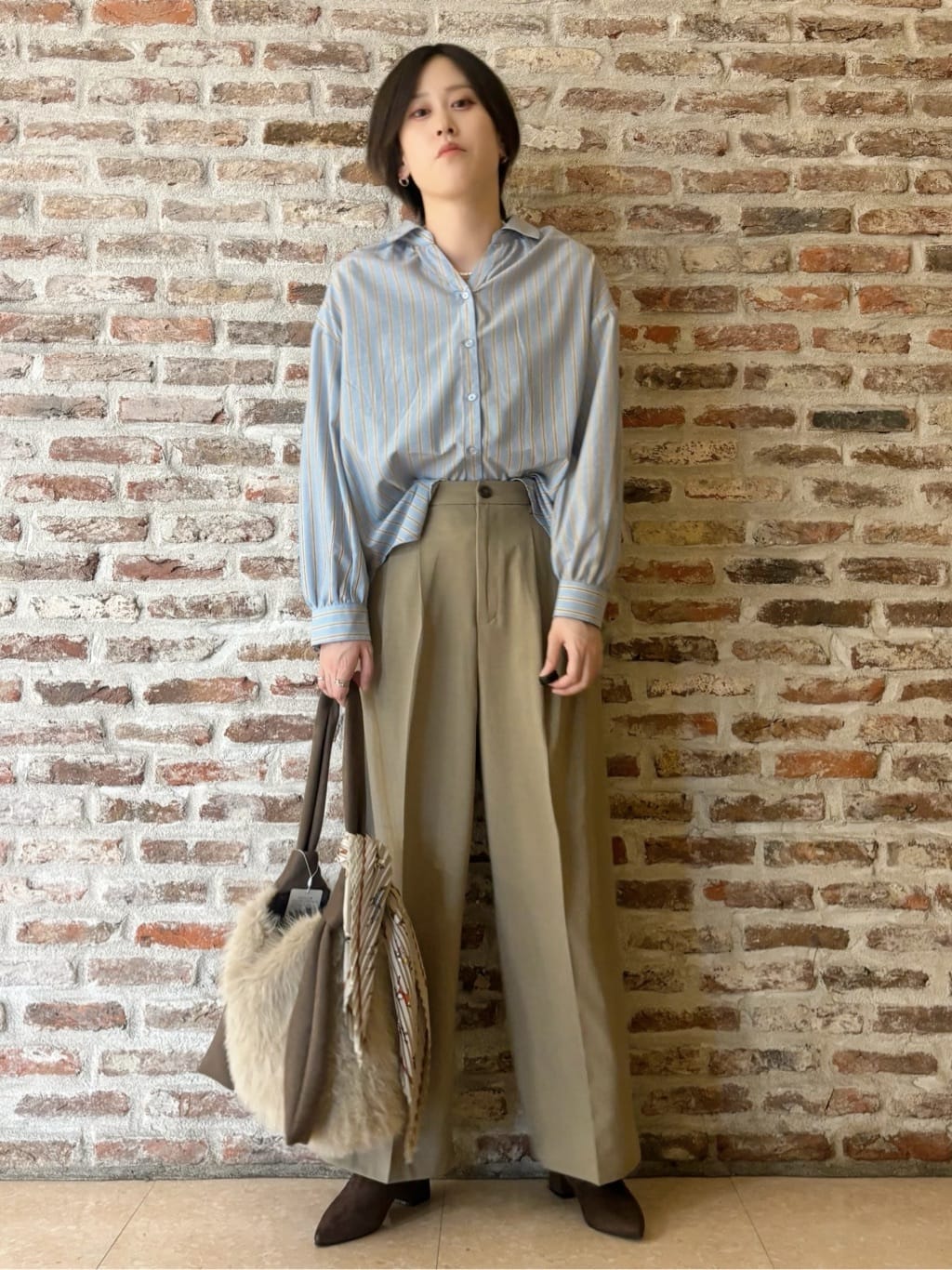 しばさんの「THE SHOP TK｜【ふわふわあったか】フェザーカーディガン」を使ったコーディネート