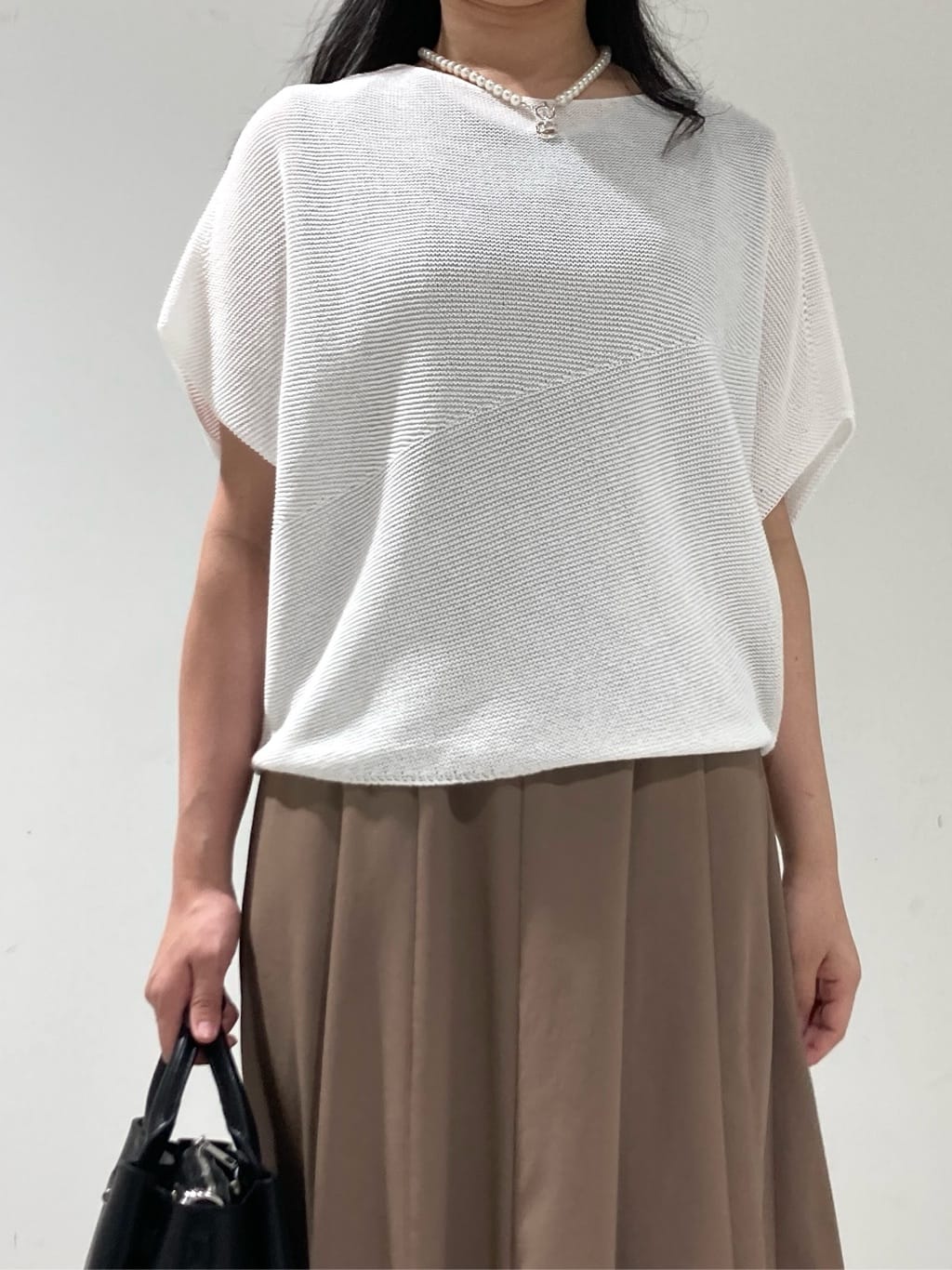 momokoさんの「INDIVI｜【洗える／清涼感】コクーンシルエットニット」を使ったコーディネート