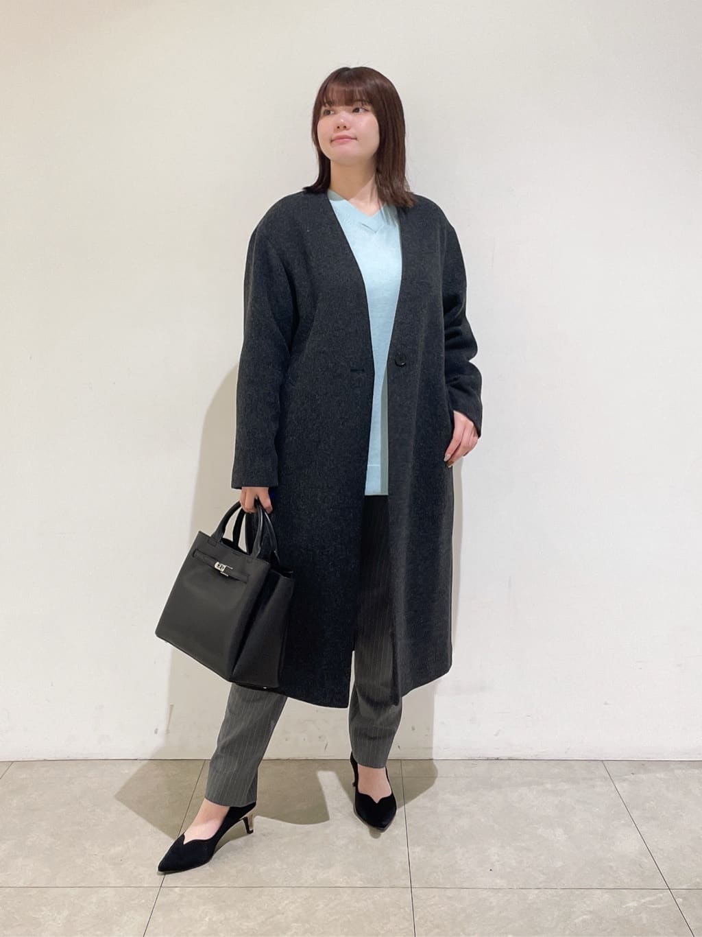 emikaさんの「INDIVI｜【軽量／ウール混】ライトフォルム ロングコート」を使ったコーディネート