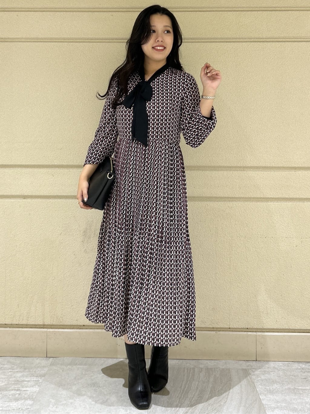 Momokaさんの「COUP DE CHANCE｜【リボン取り外し可】幾何柄プリーツワンピース」を使ったコーディネート