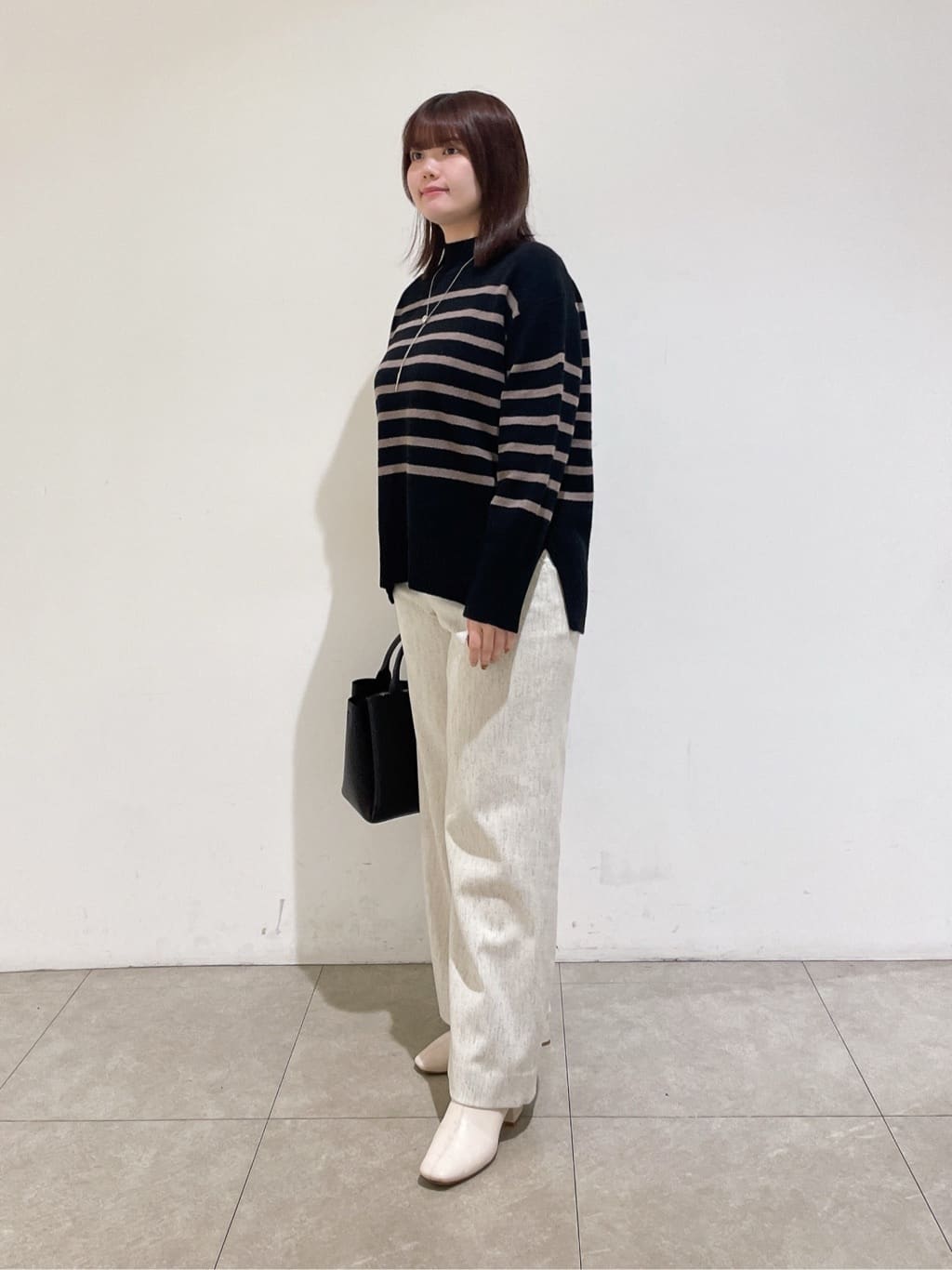 emikaさんの「INDIVI｜【冬ニット人気NO．1！／カシミヤ混】ミドルゲージハイネックニット」を使ったコーディネート